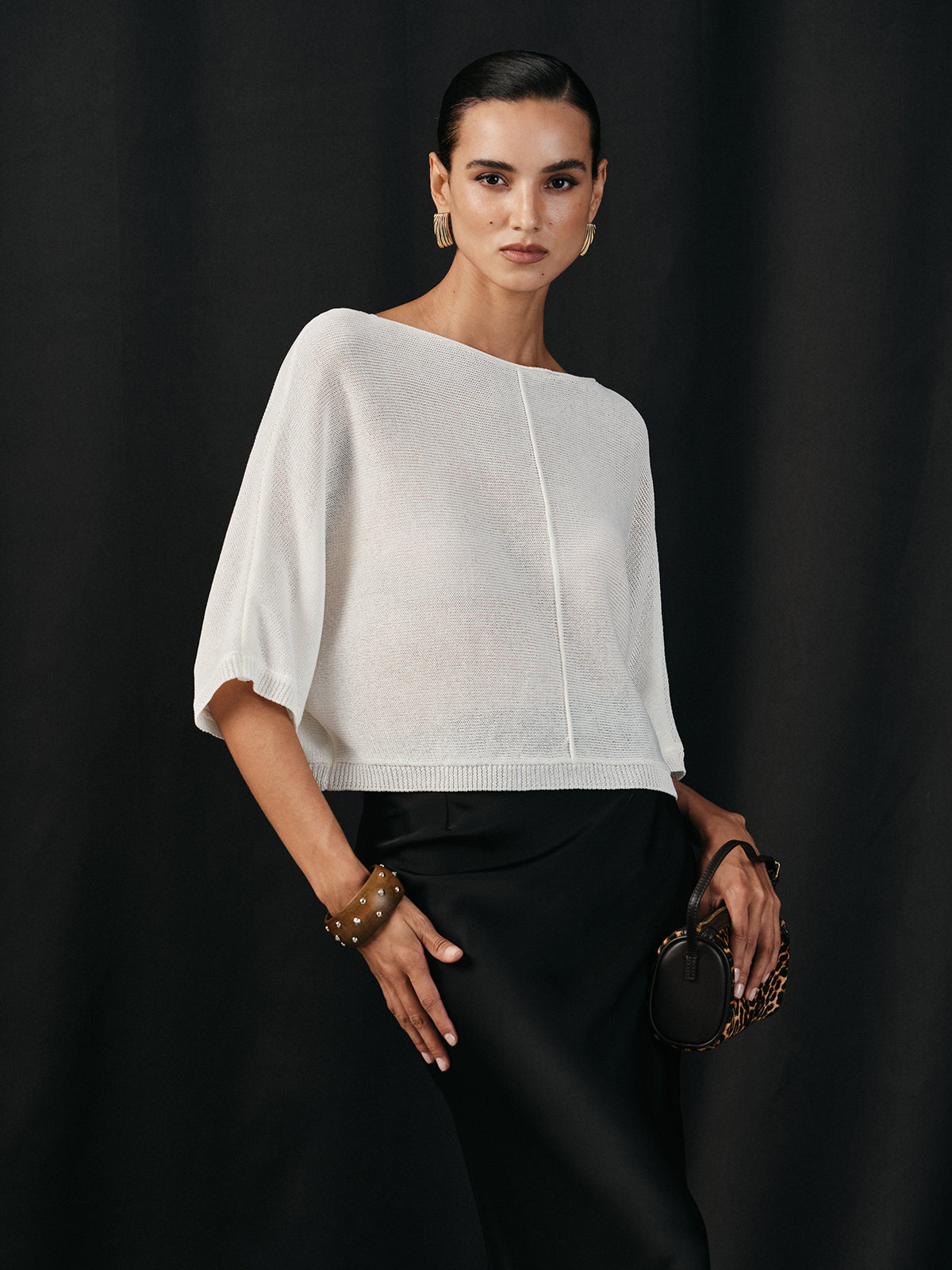 Pull chauve-souris semi-transparent