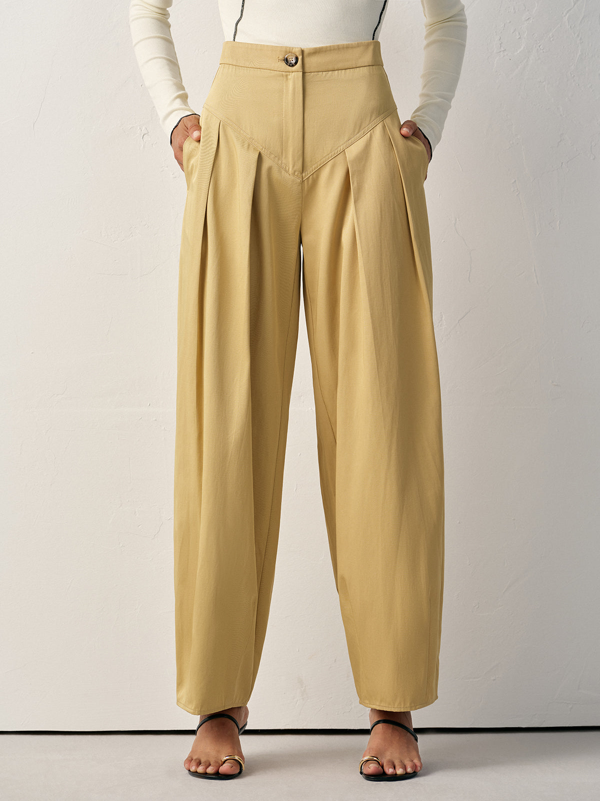 Pantalon plissé taille haute à jambes larges