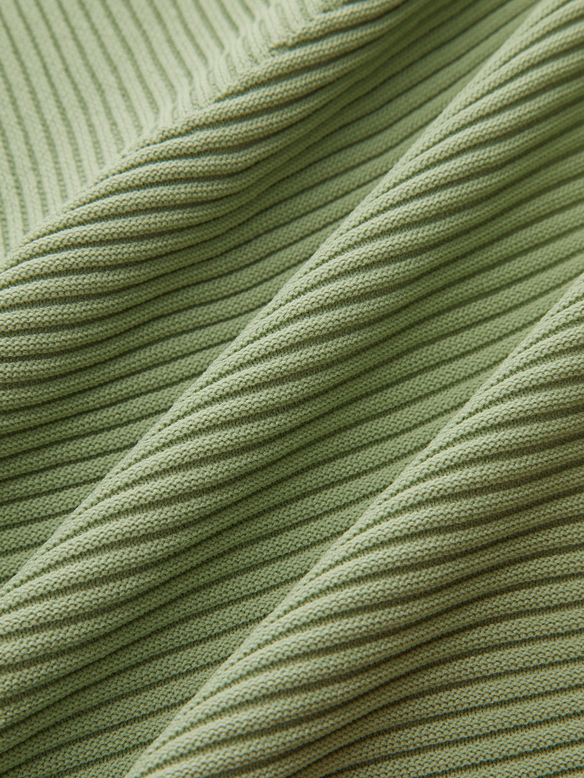 Pull en maille texturée à col en V et ourlet asymétrique