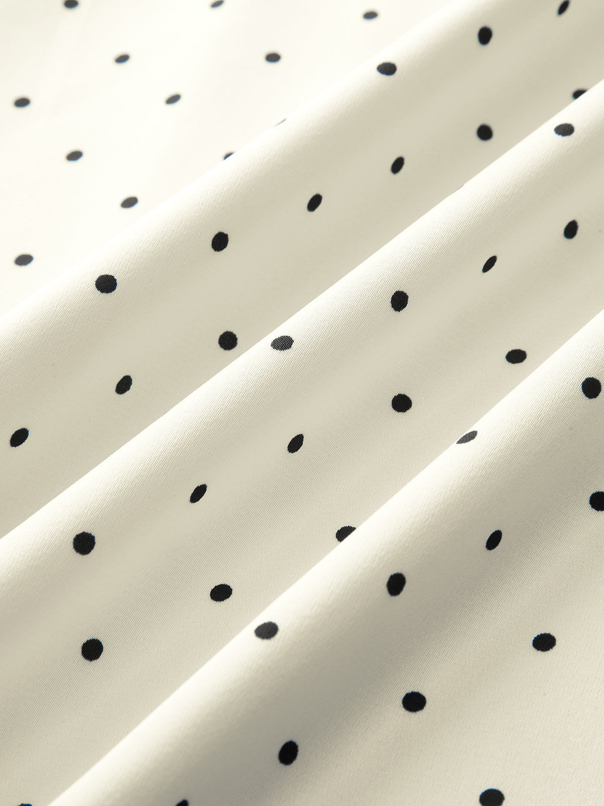 Robe midi caraco à pois et dentelle