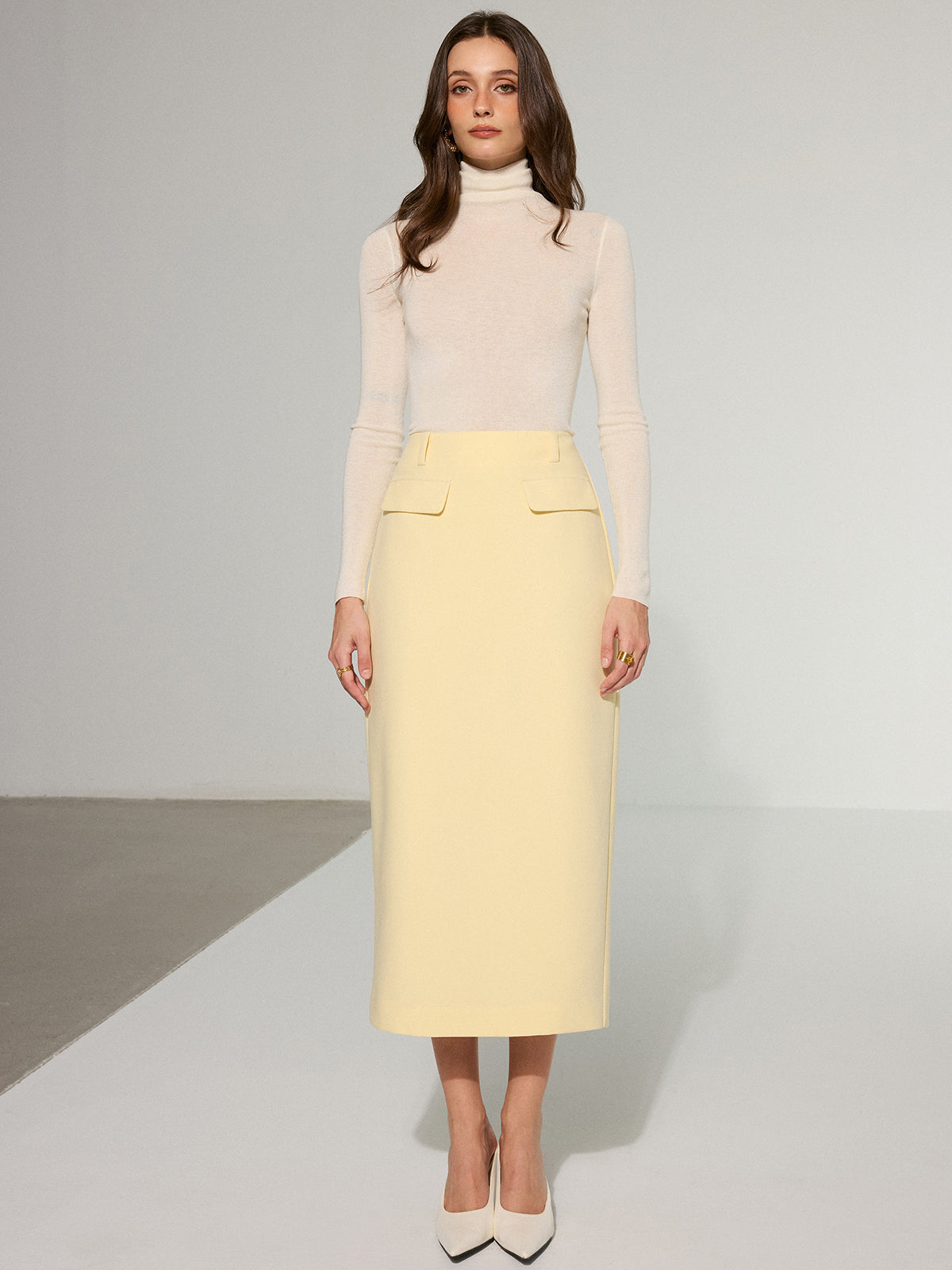 Midirock mit Ziertasche und Rückenschlitz