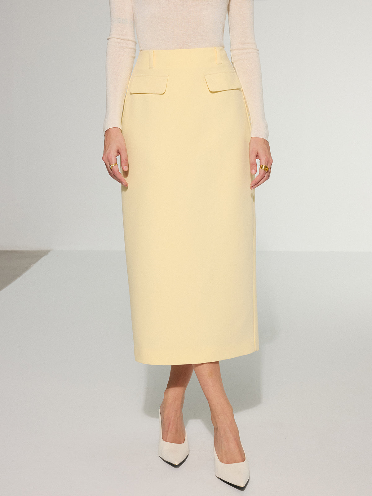 Midirock mit Ziertasche und Rückenschlitz