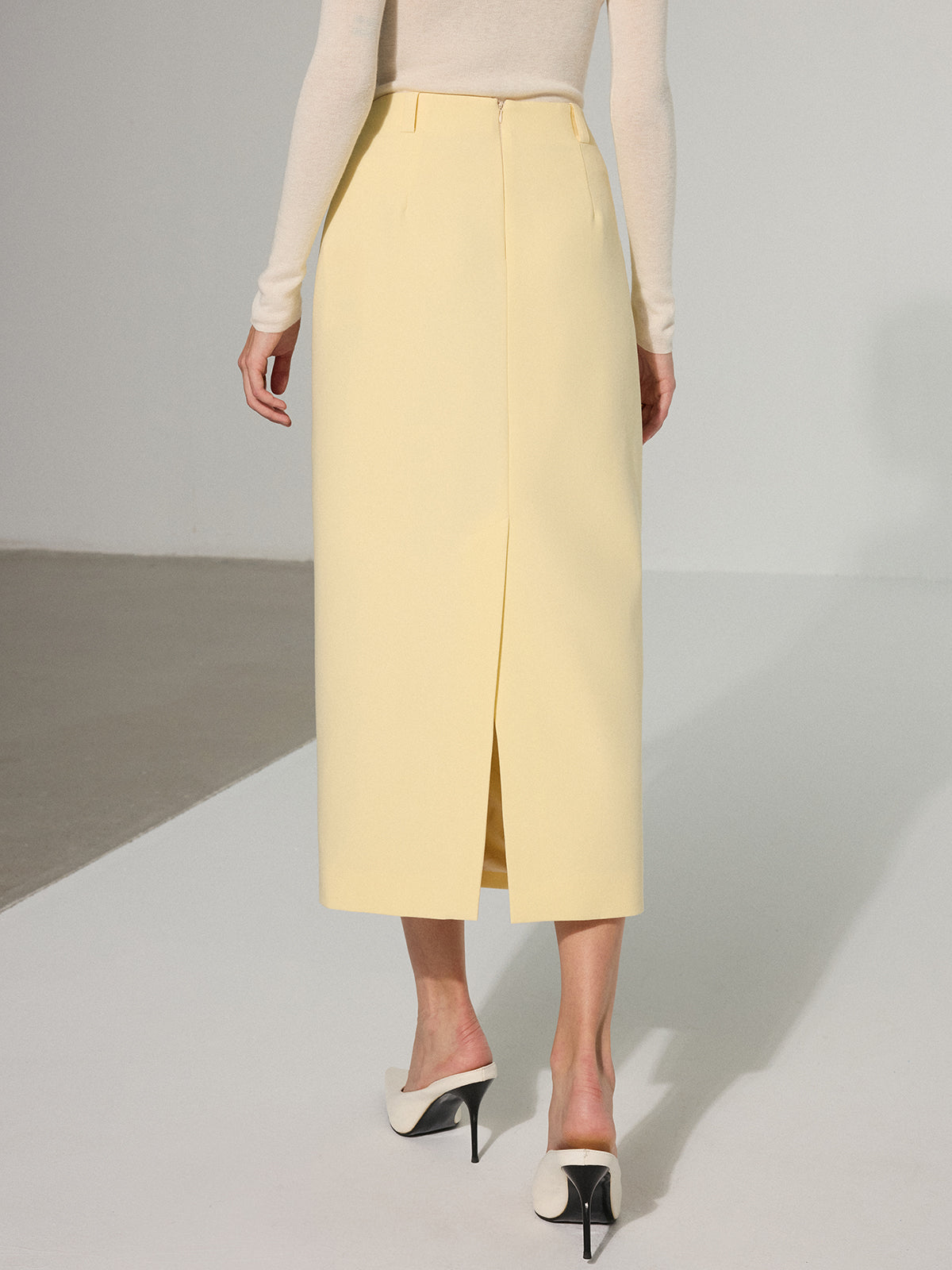 Midirock mit Ziertasche und Rückenschlitz