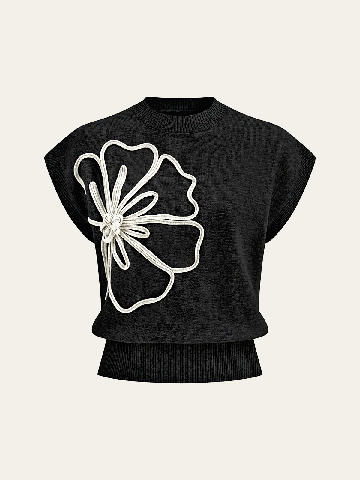 Haut en maille à manches courtes et applique florale