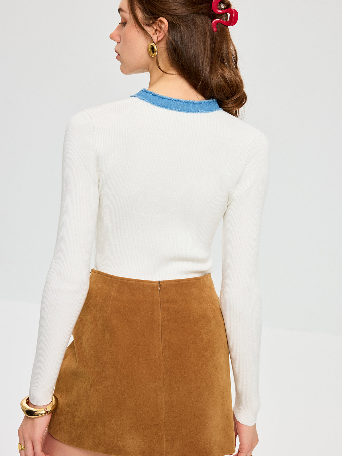 Stricktop aus Wollmischung mit Denim-Besatz und Metalldetail