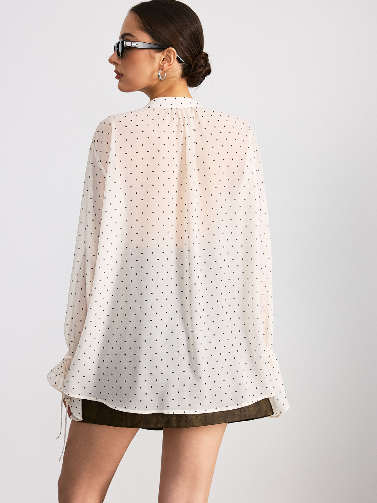 Chemise à manches longues à pois et volants