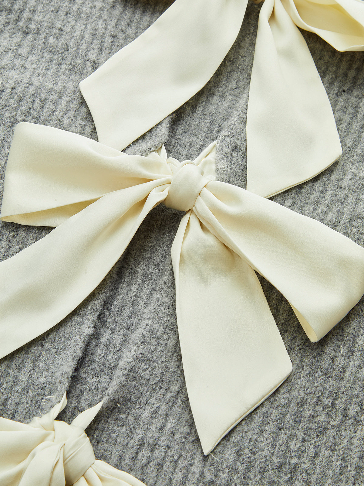 Wool Blend Short Sleeve Bow Knit Top