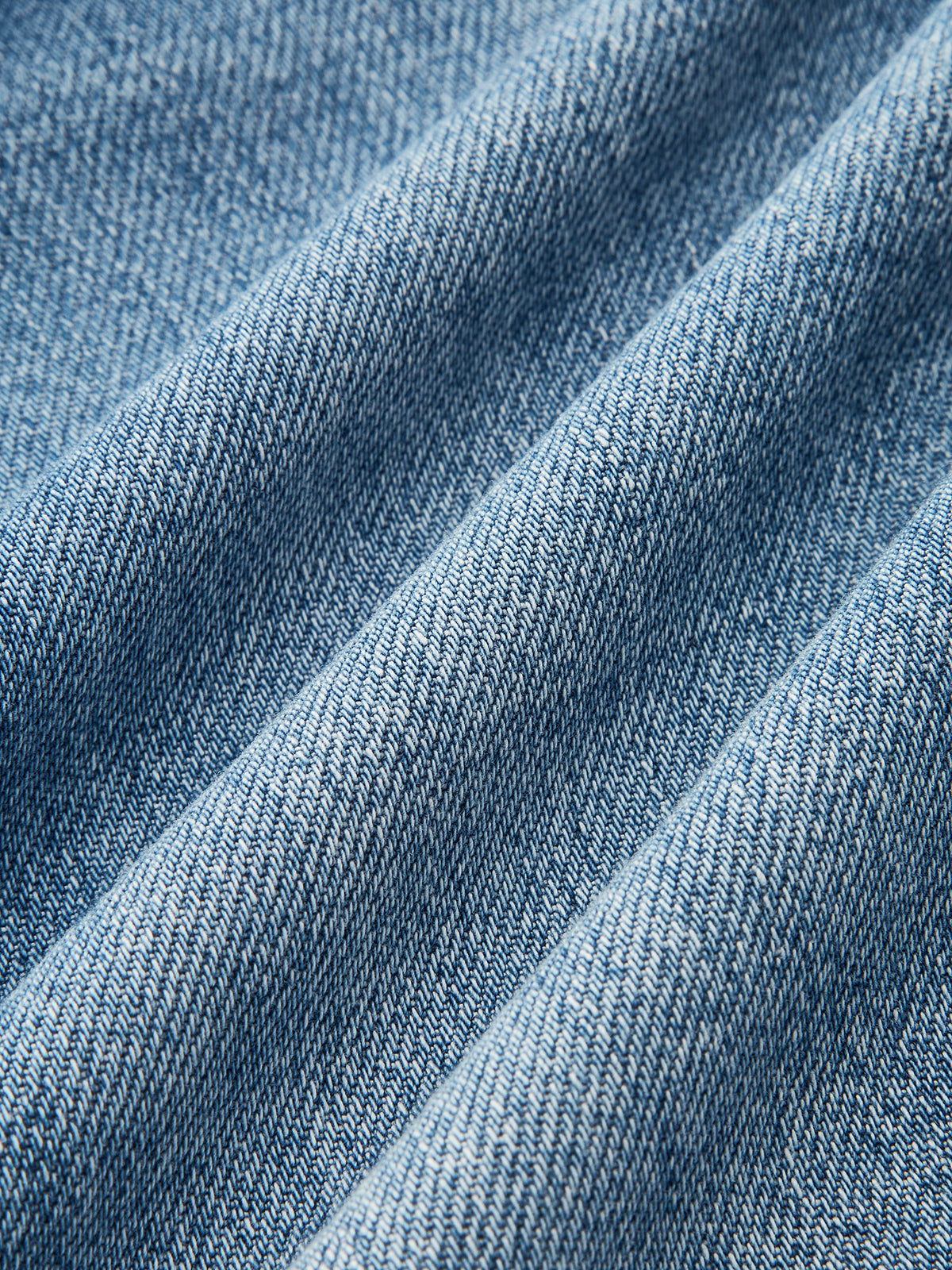 Jean en denim à jambes incurvées