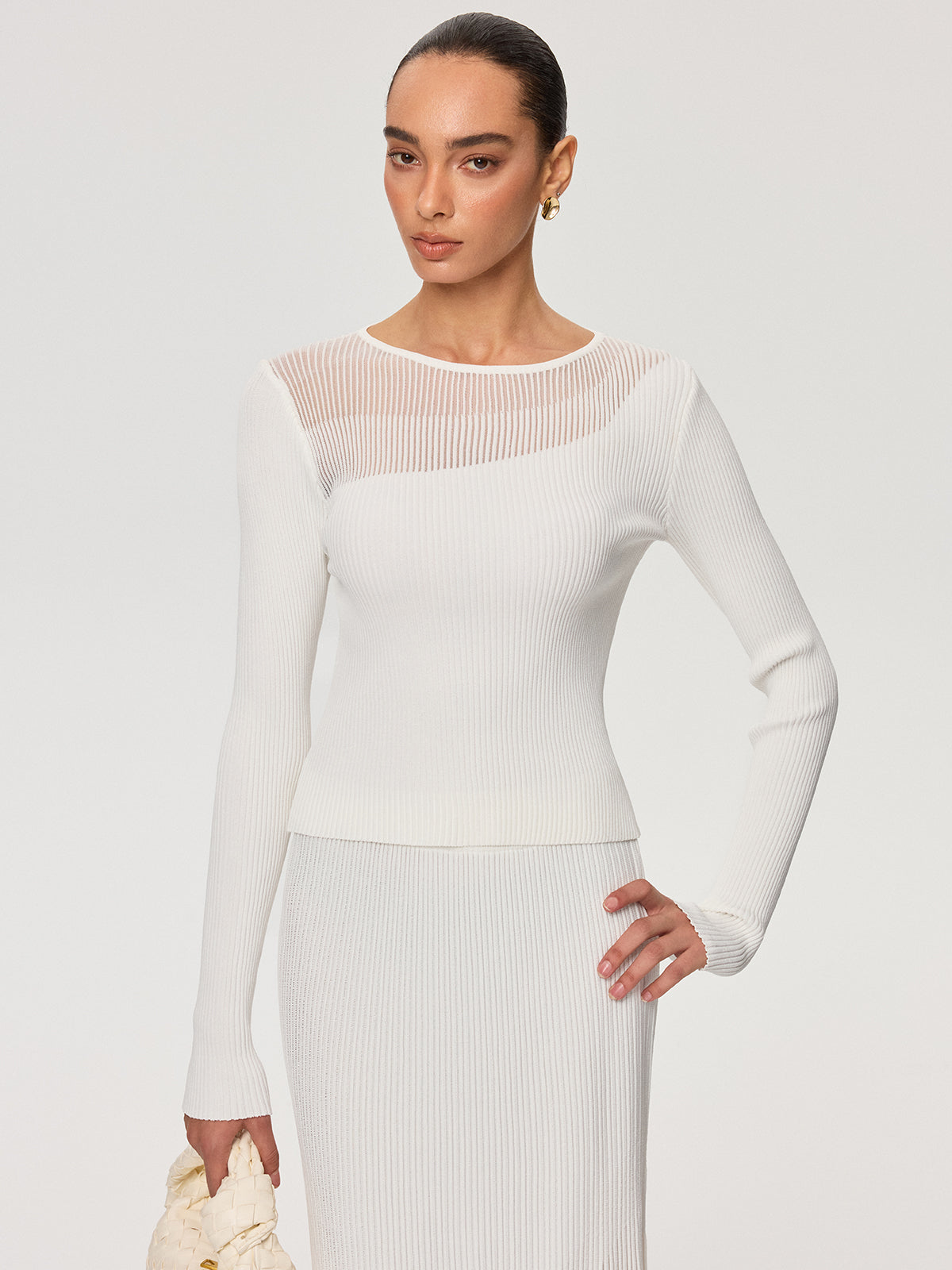 Haut en maille côtelée à empiècements transparents