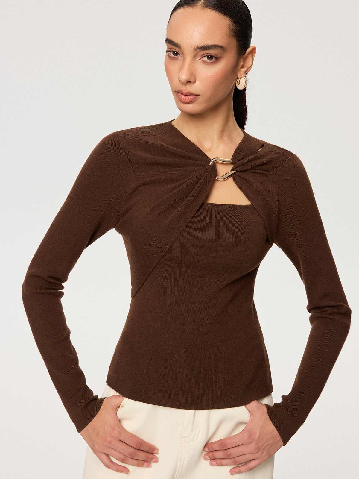 Langarm-Stricktop mit Metallring-Detail