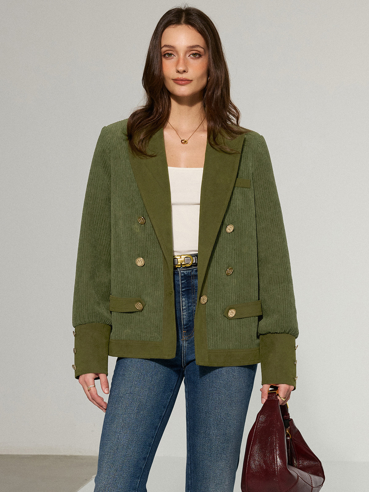 Blazer en velours côtelé avec revers et boutons métalliques