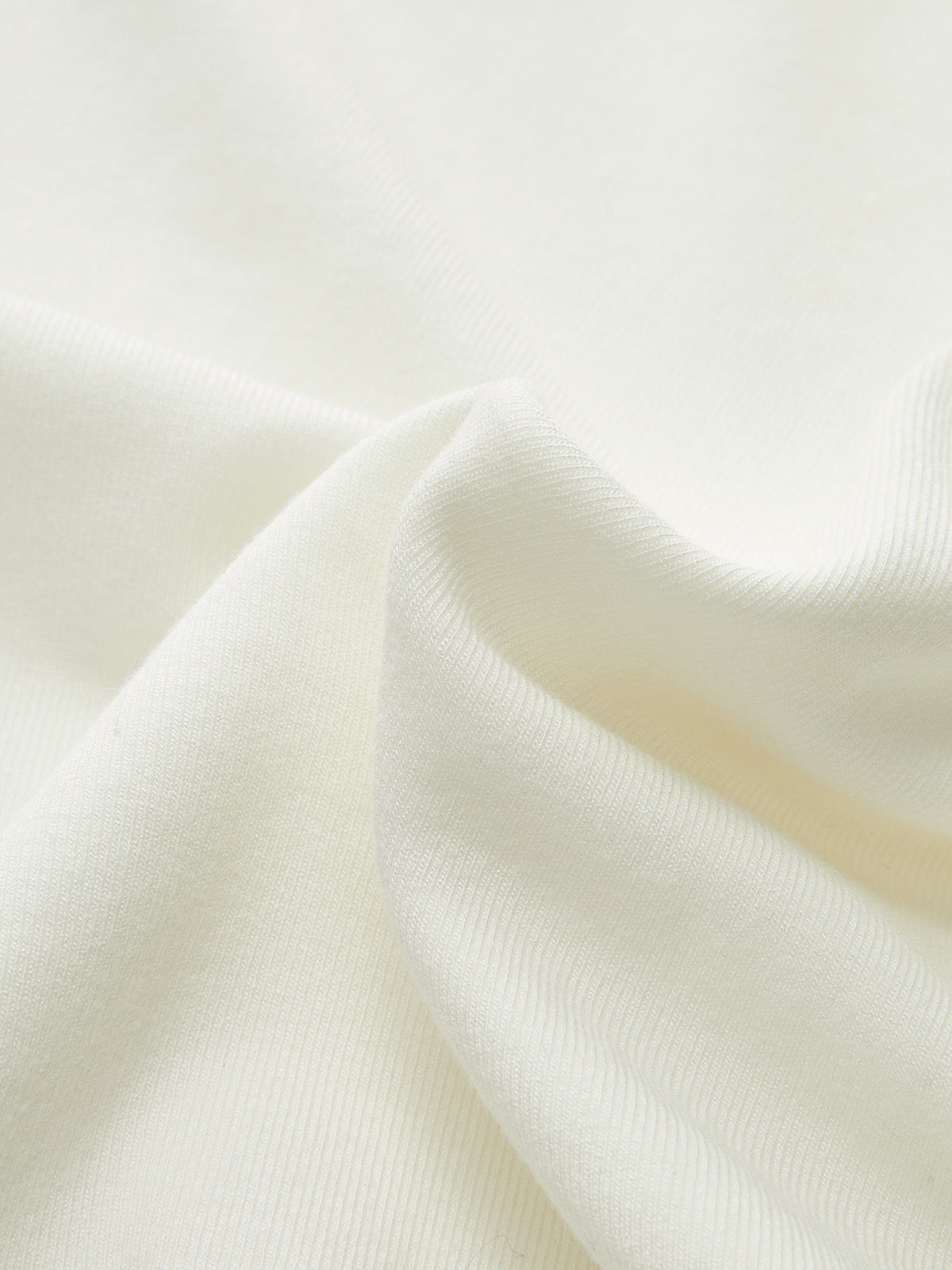 T-shirt à manches longues froncé à ourlet asymétrique