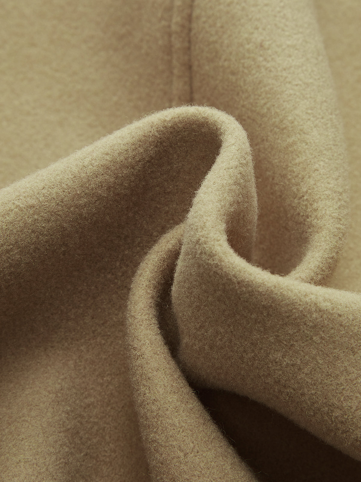 Manteau asymétrique à boutons en laine mélangée