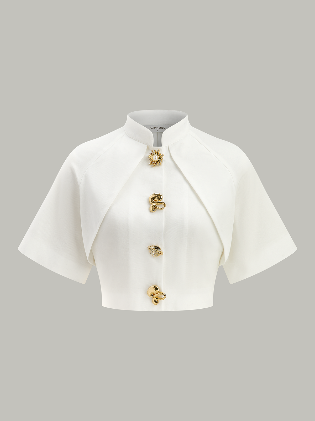 Kurz geschnittene Bluse mit Metalldekor