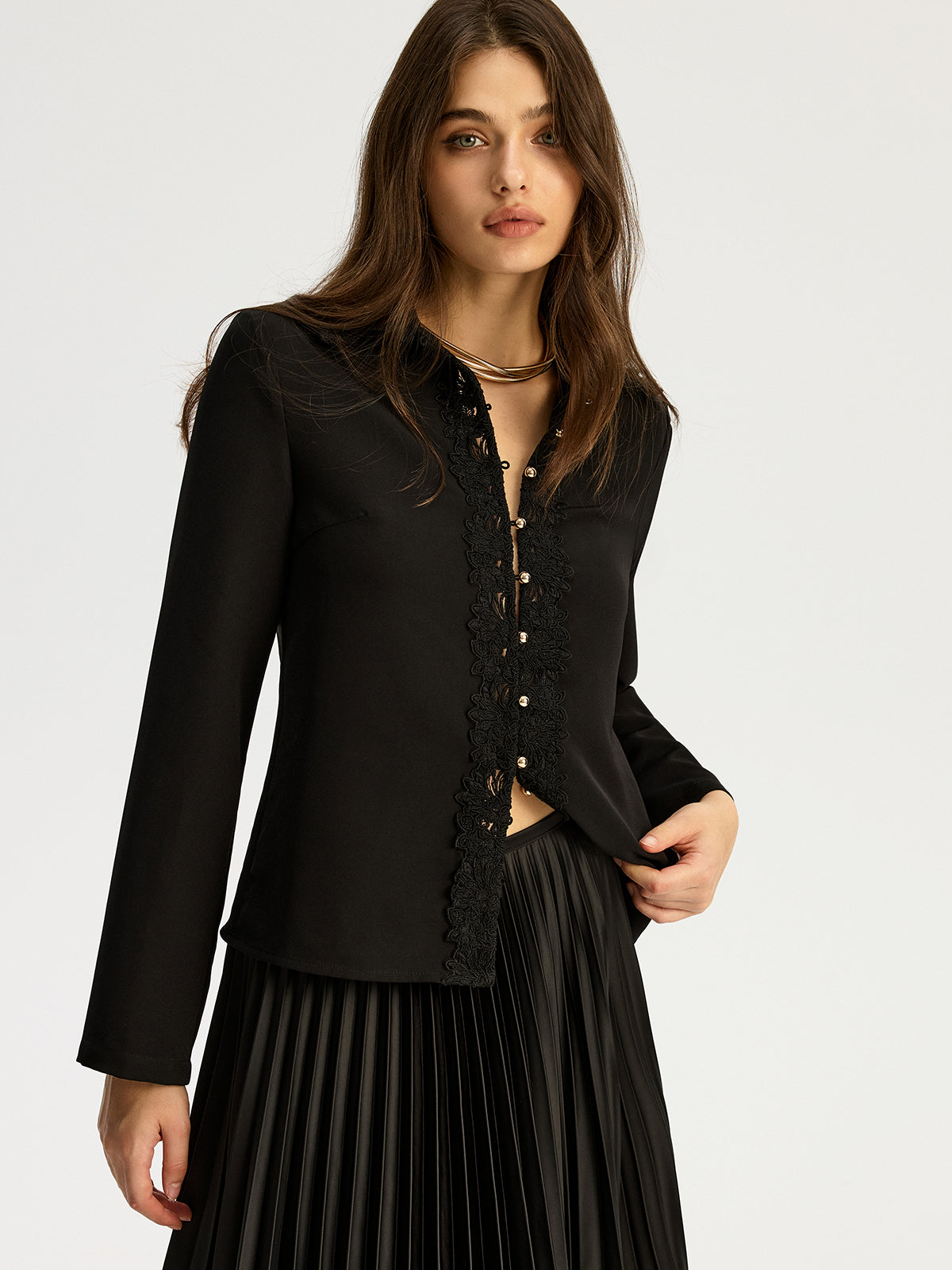 Spitzenbesetzte Bluse