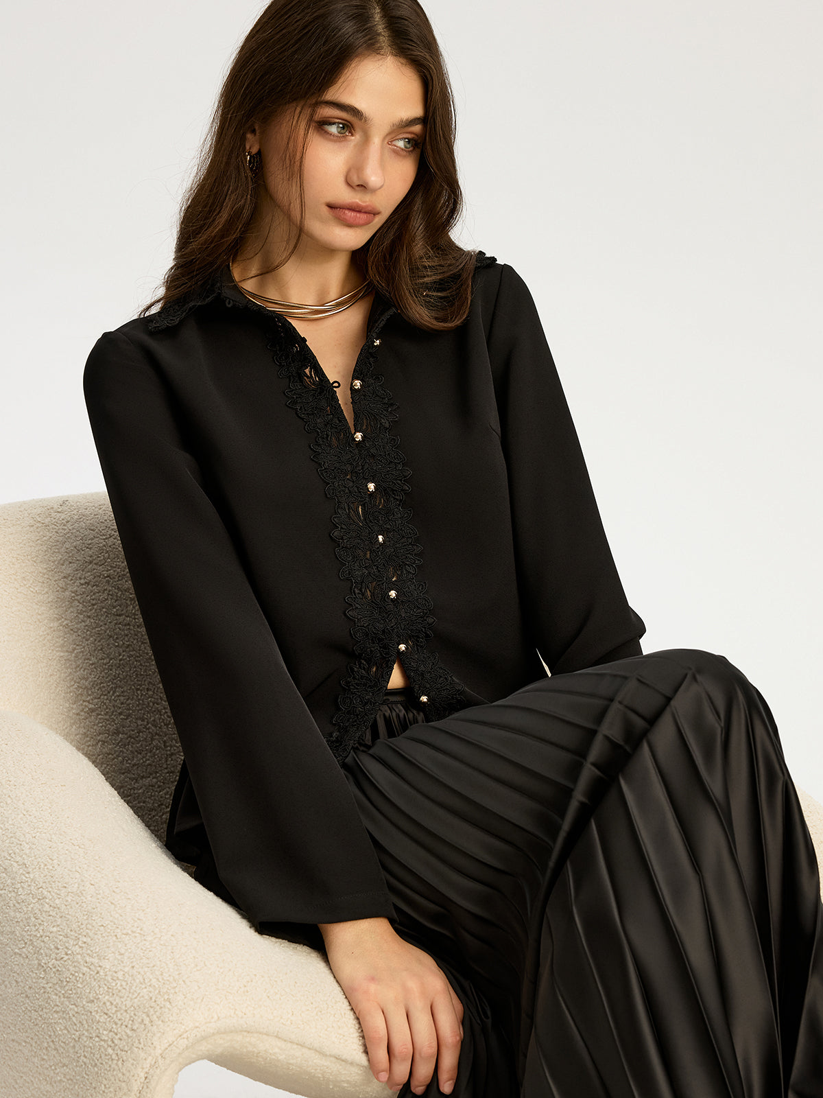 Spitzenbesetzte Bluse