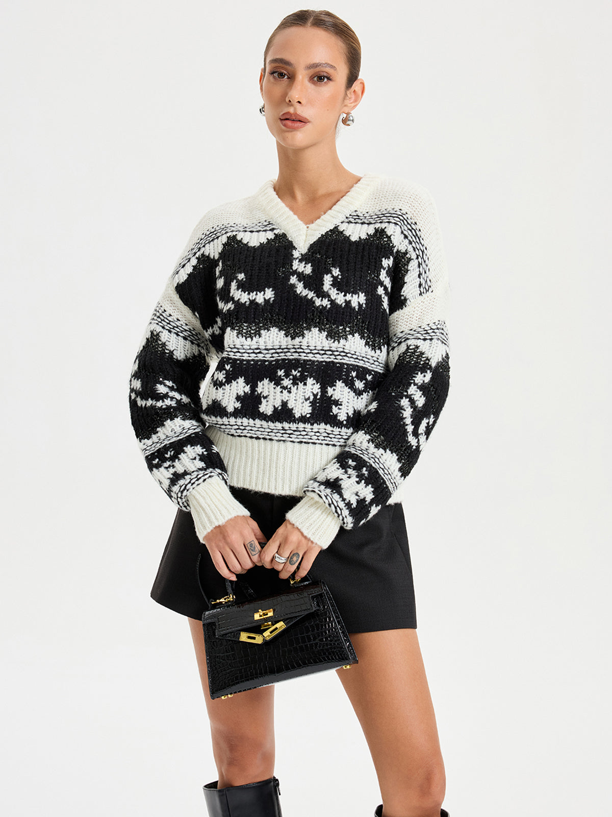 Pull Cowichan à col en V et sequins