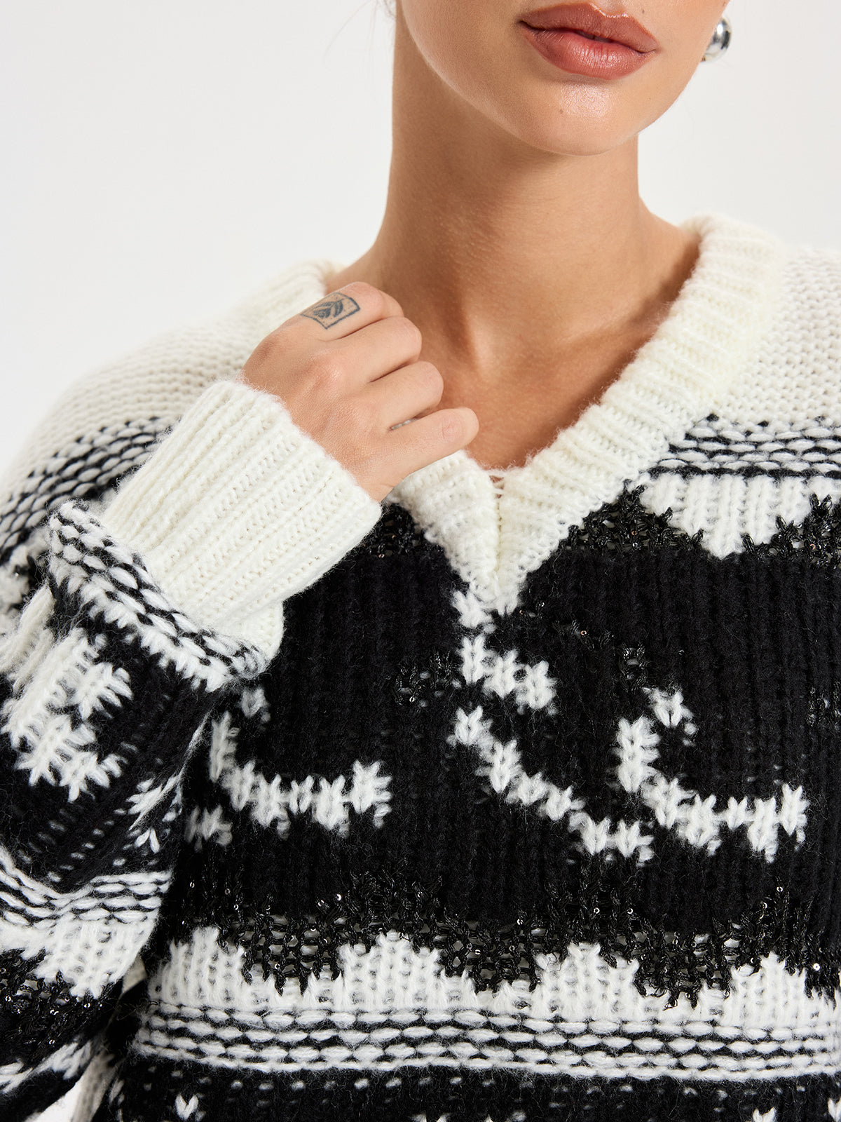 Pull Cowichan à col en V et sequins