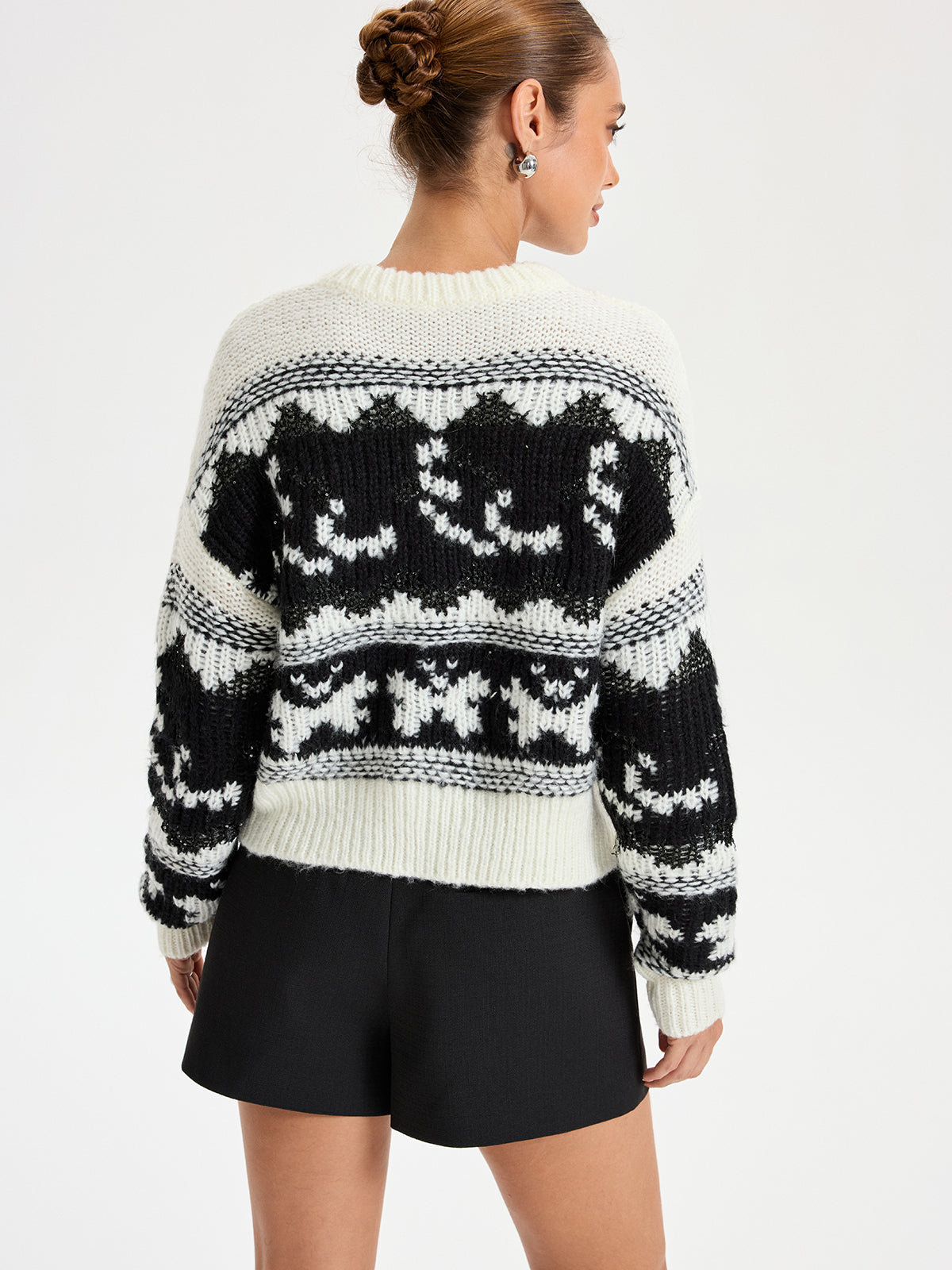 Pull Cowichan à col en V et sequins