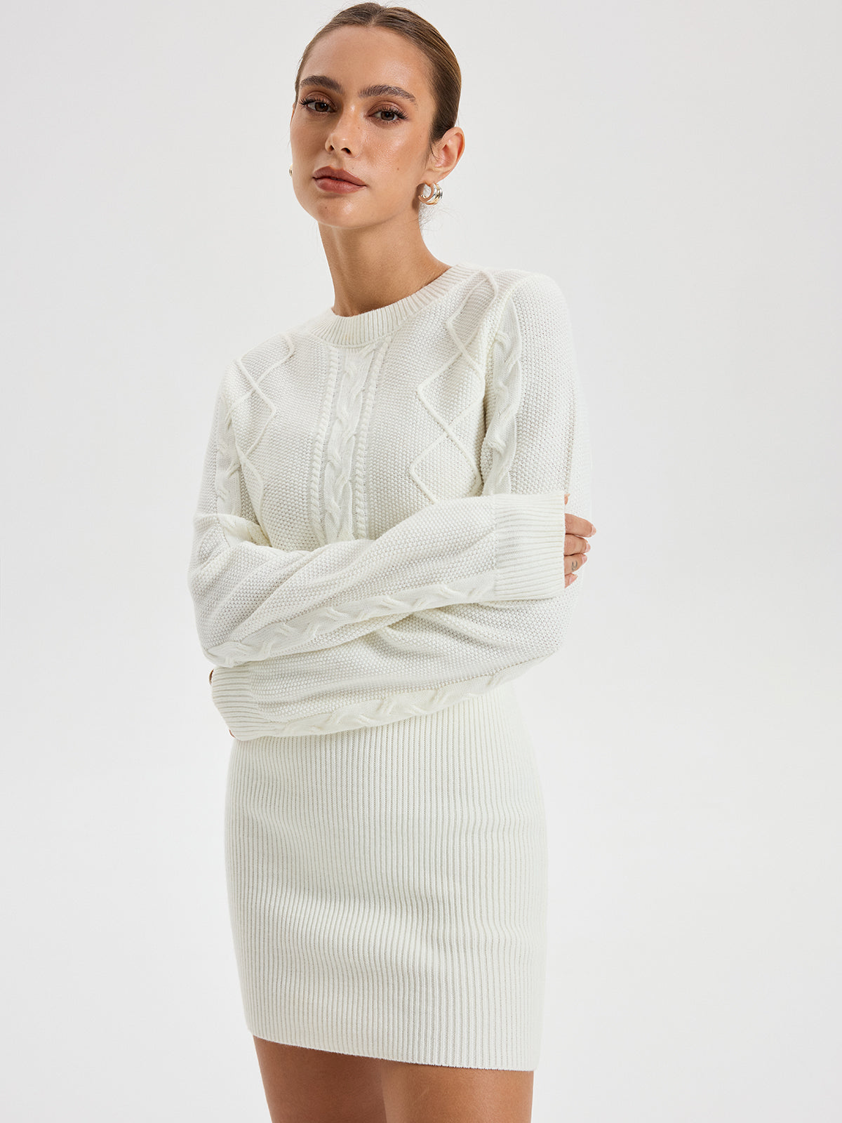 Robe pull à col rond en maille torsadée