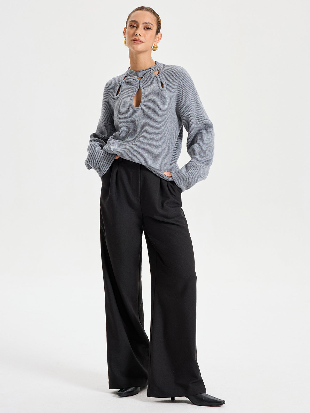 Pull en maille découpé