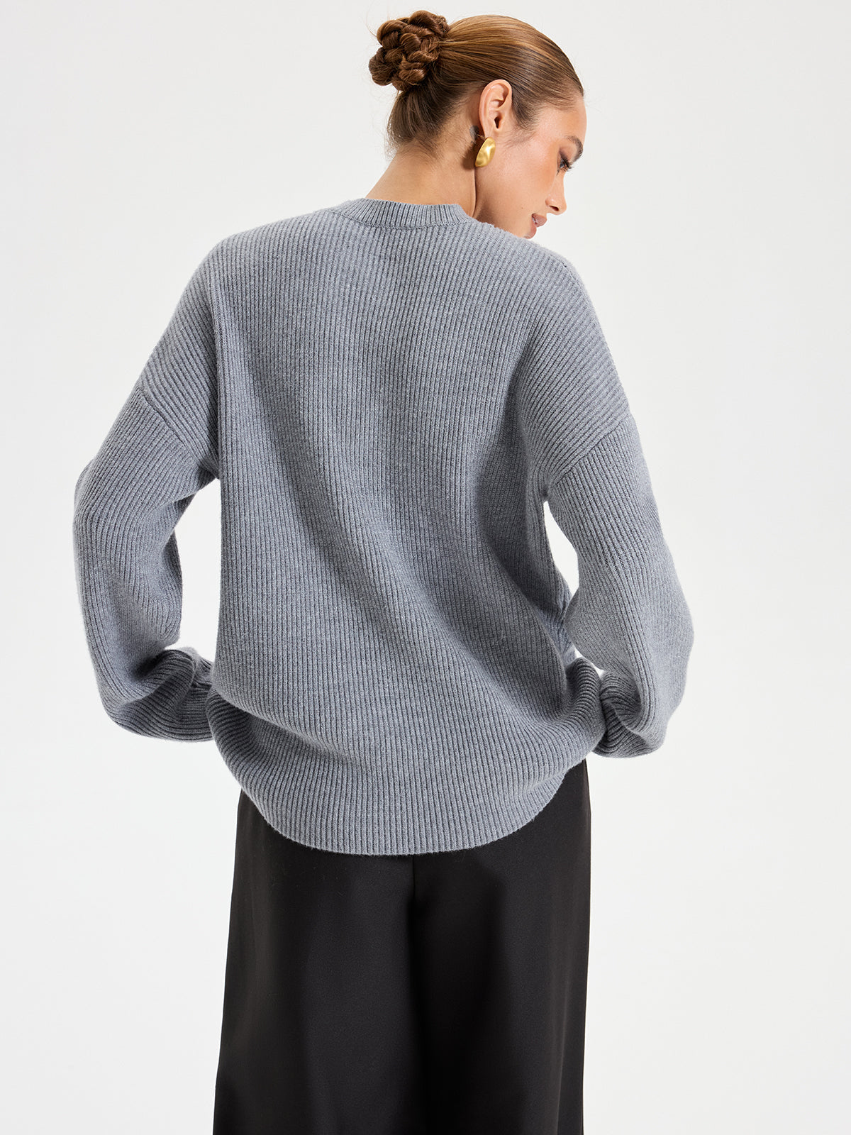 Pull en maille découpé