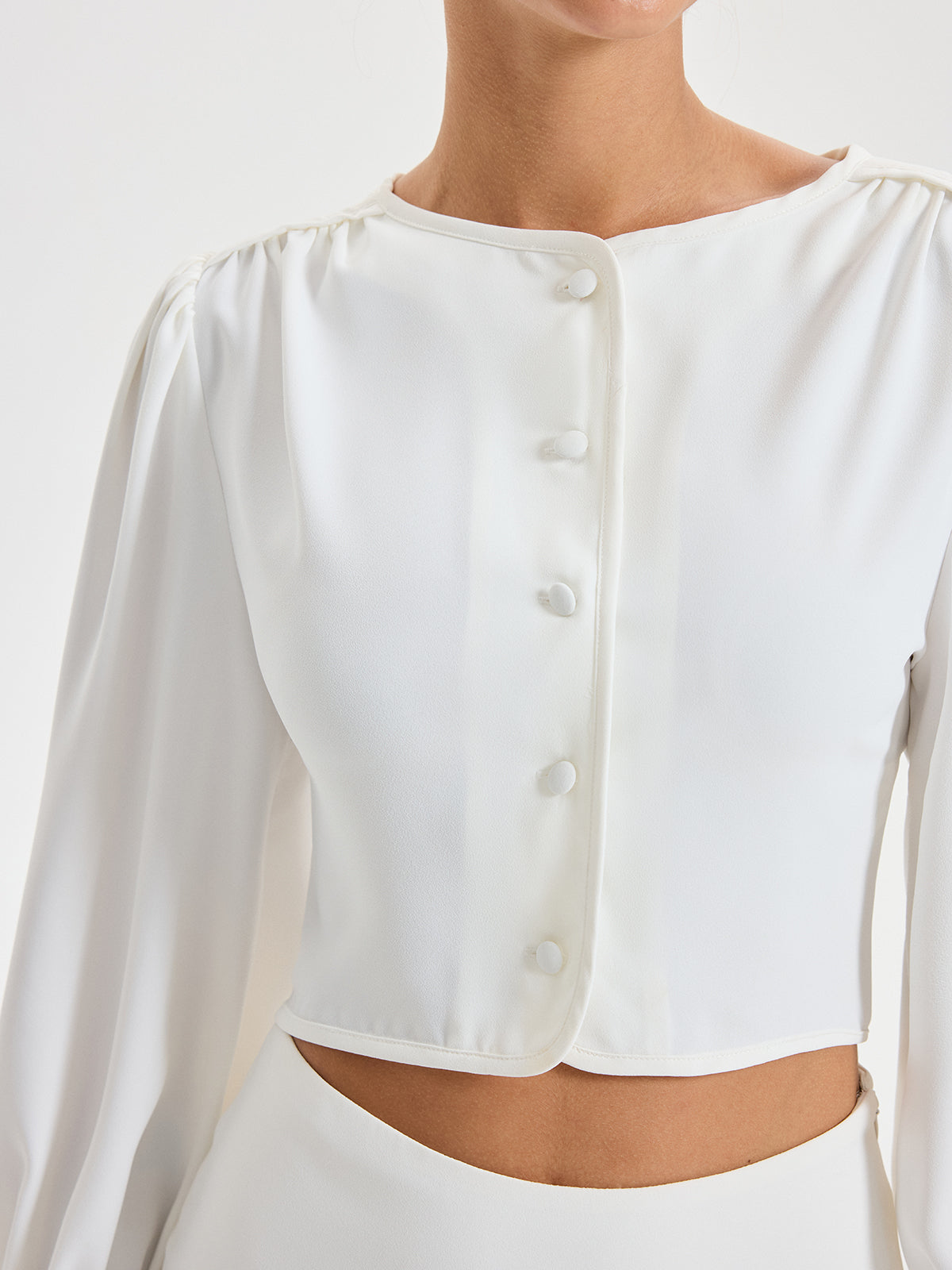 Ensemble crop top à manches longues et jupe longue