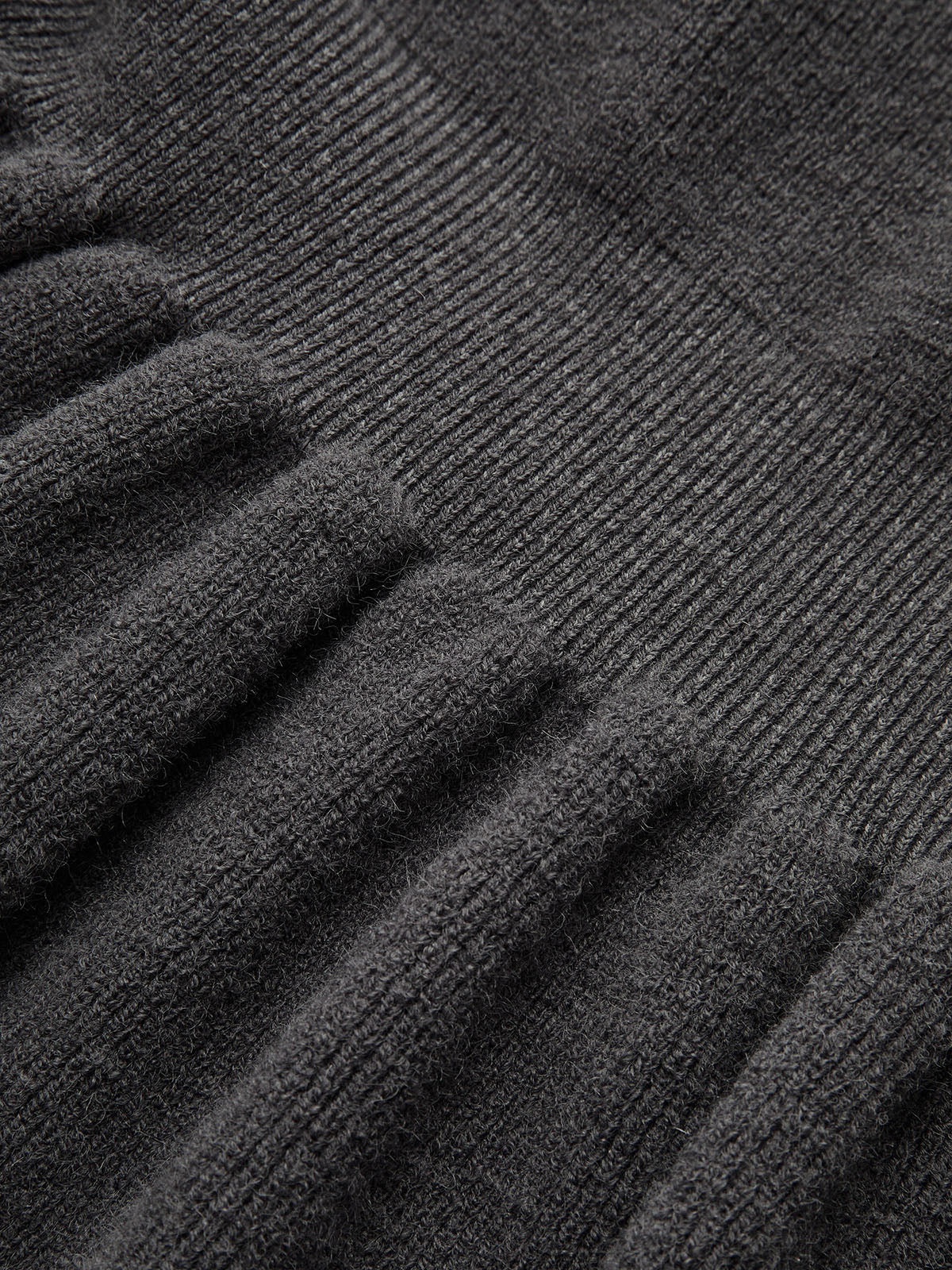 Langärmliges Strickoberteil mit Schößchensaum
