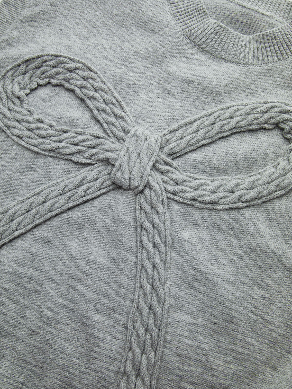 Strickweste mit Schleifendetail