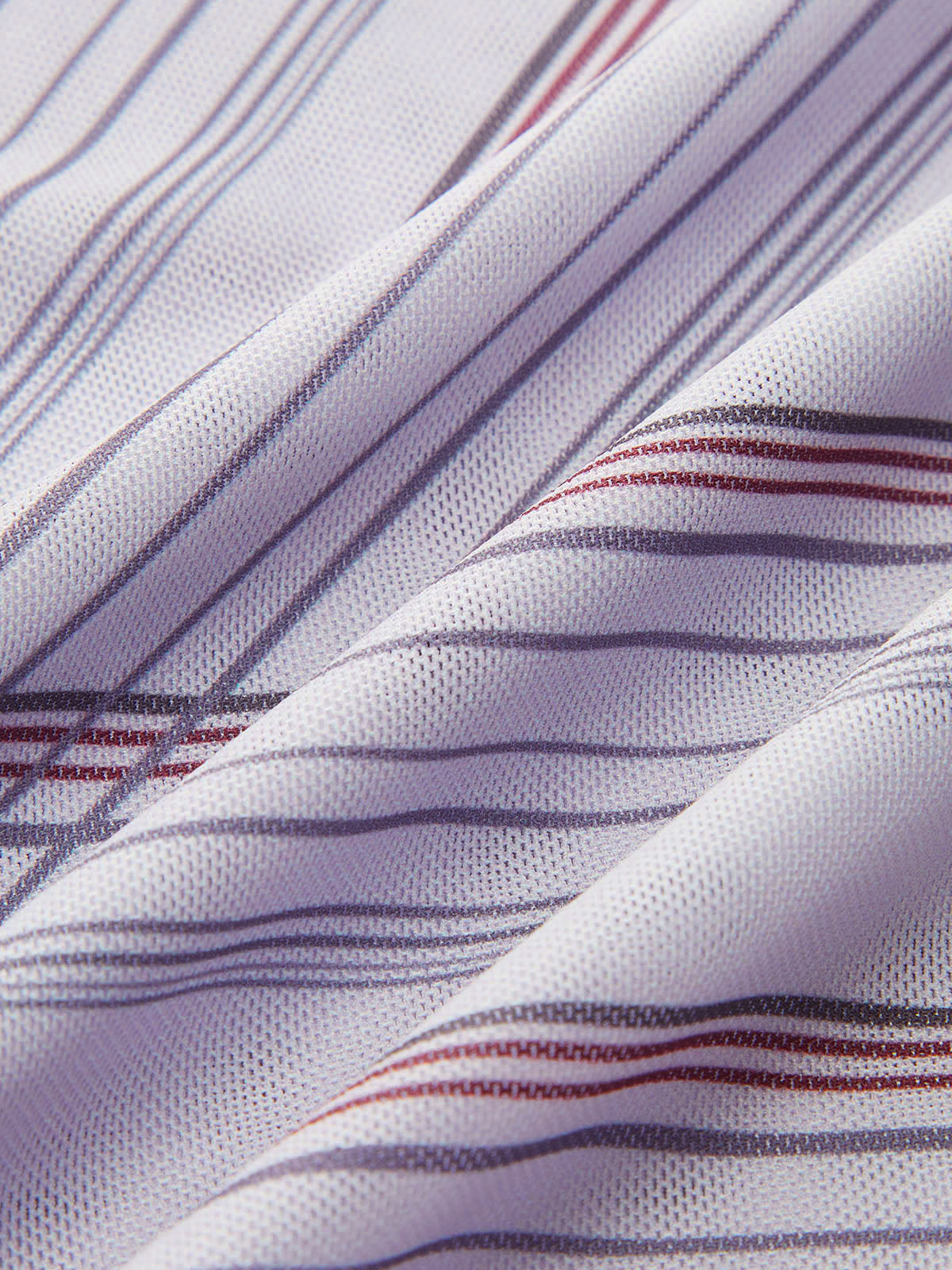 Haut asymétrique à rayures en maille