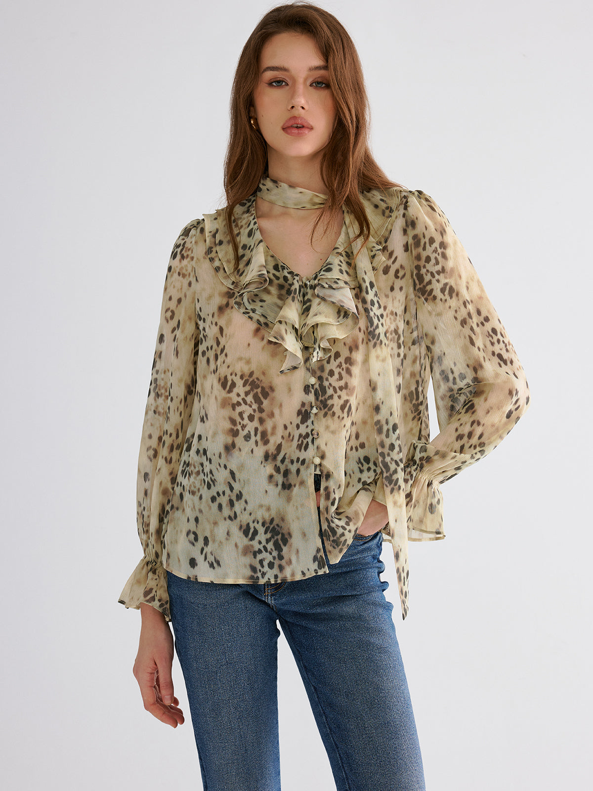 Halbtransparente Rüschenbluse mit Leopardenmuster