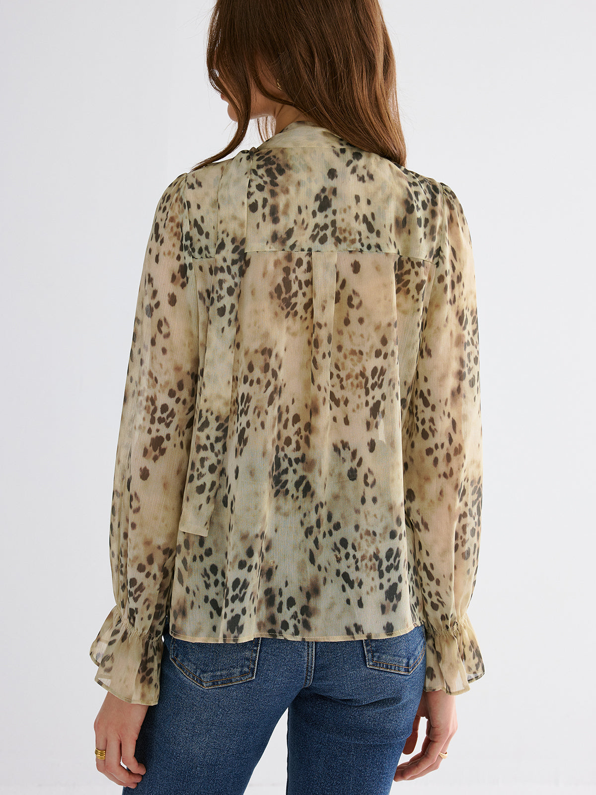 Halbtransparente Rüschenbluse mit Leopardenmuster