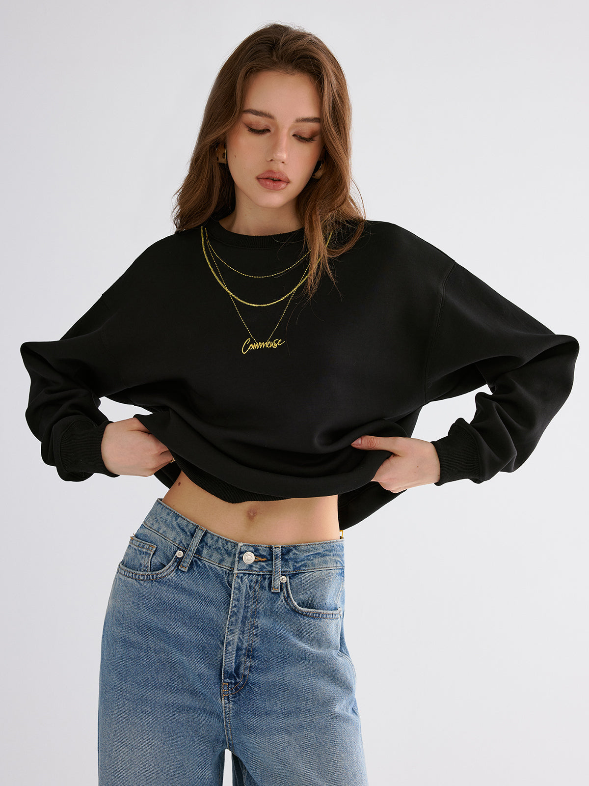 Sweatshirt mit goldener Kettenstickerei