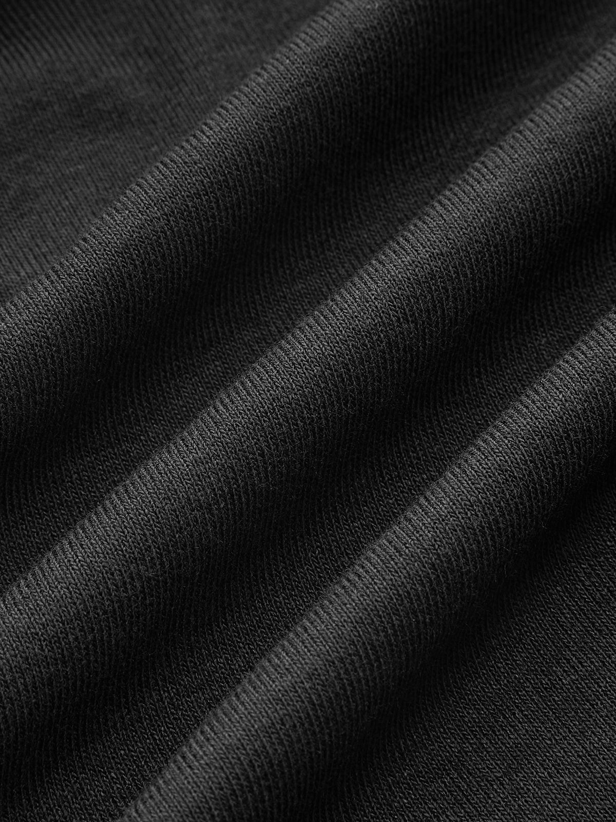 Haut à manches longues et col roulé en maille transparente