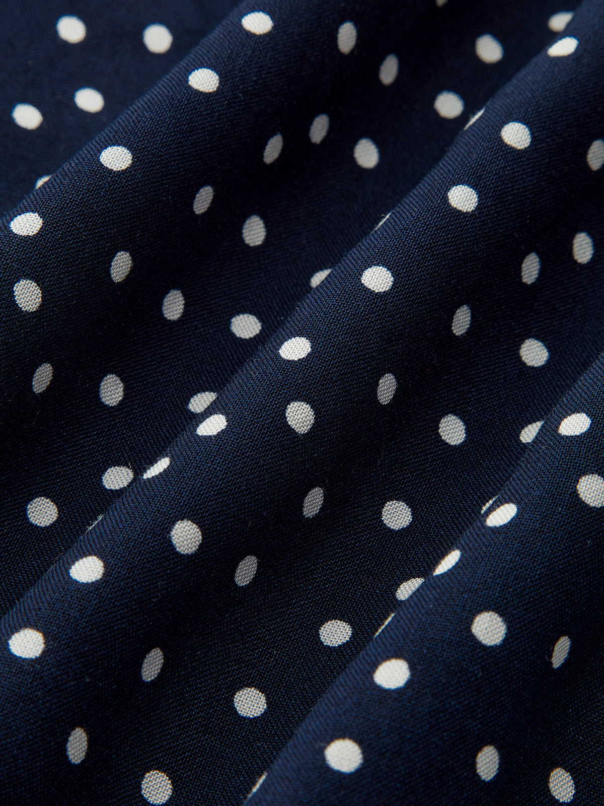 Gepunktetes Maxikleid mit V-Ausschnitt und Spitzenborte
