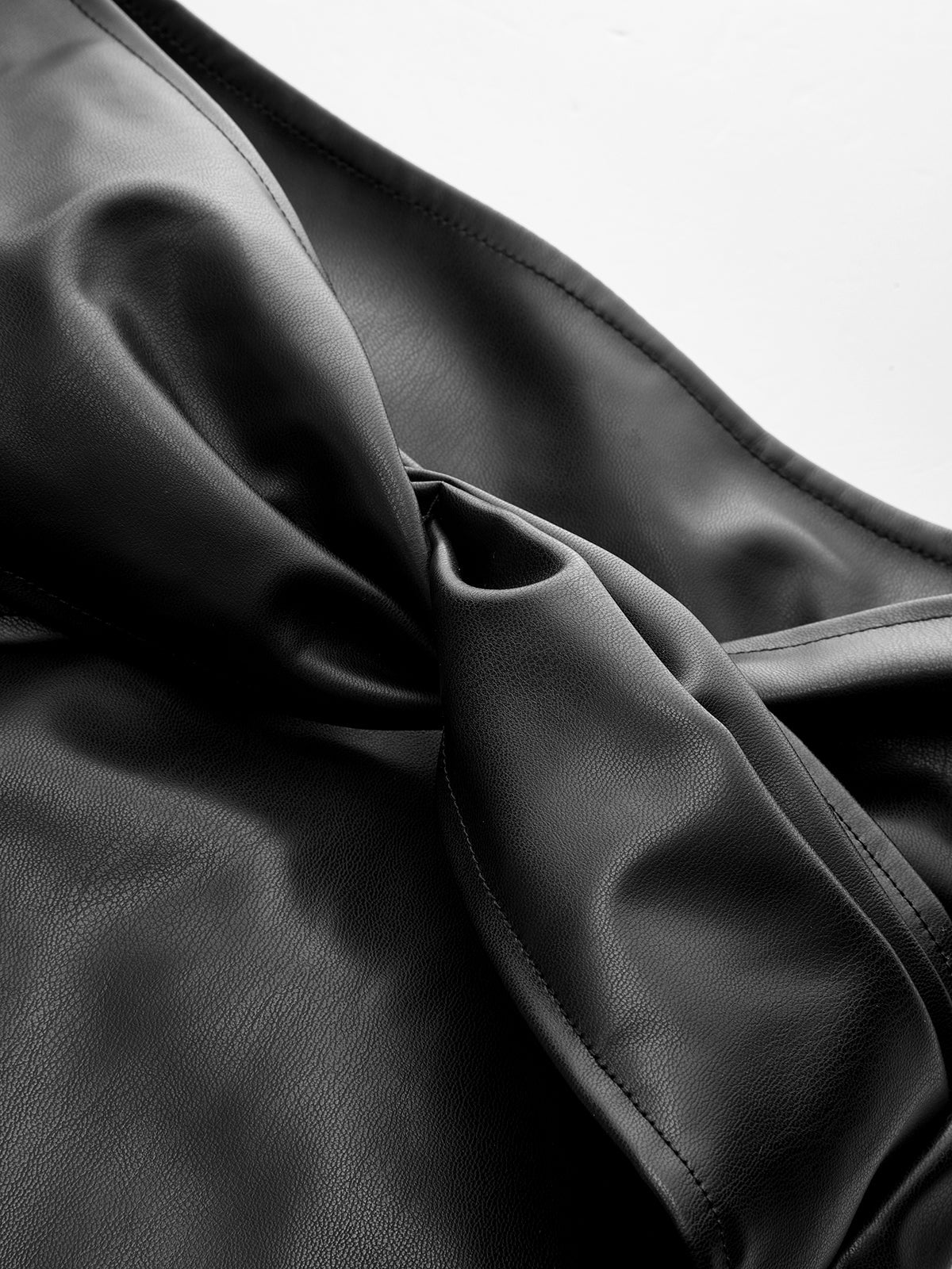 Ruched Twisted Faux Leather Skirt