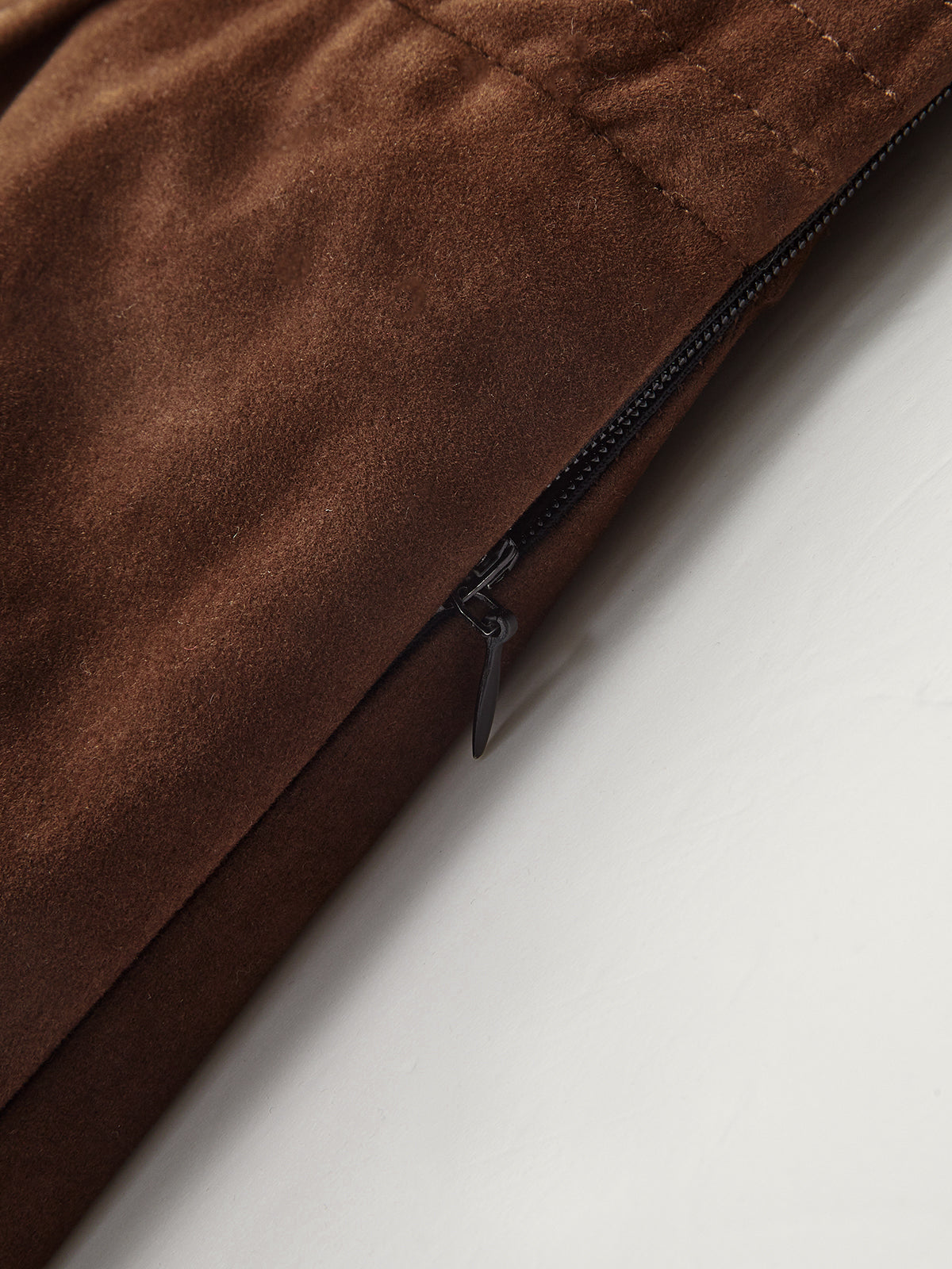 Mini-jupe asymétrique plissée effet daim