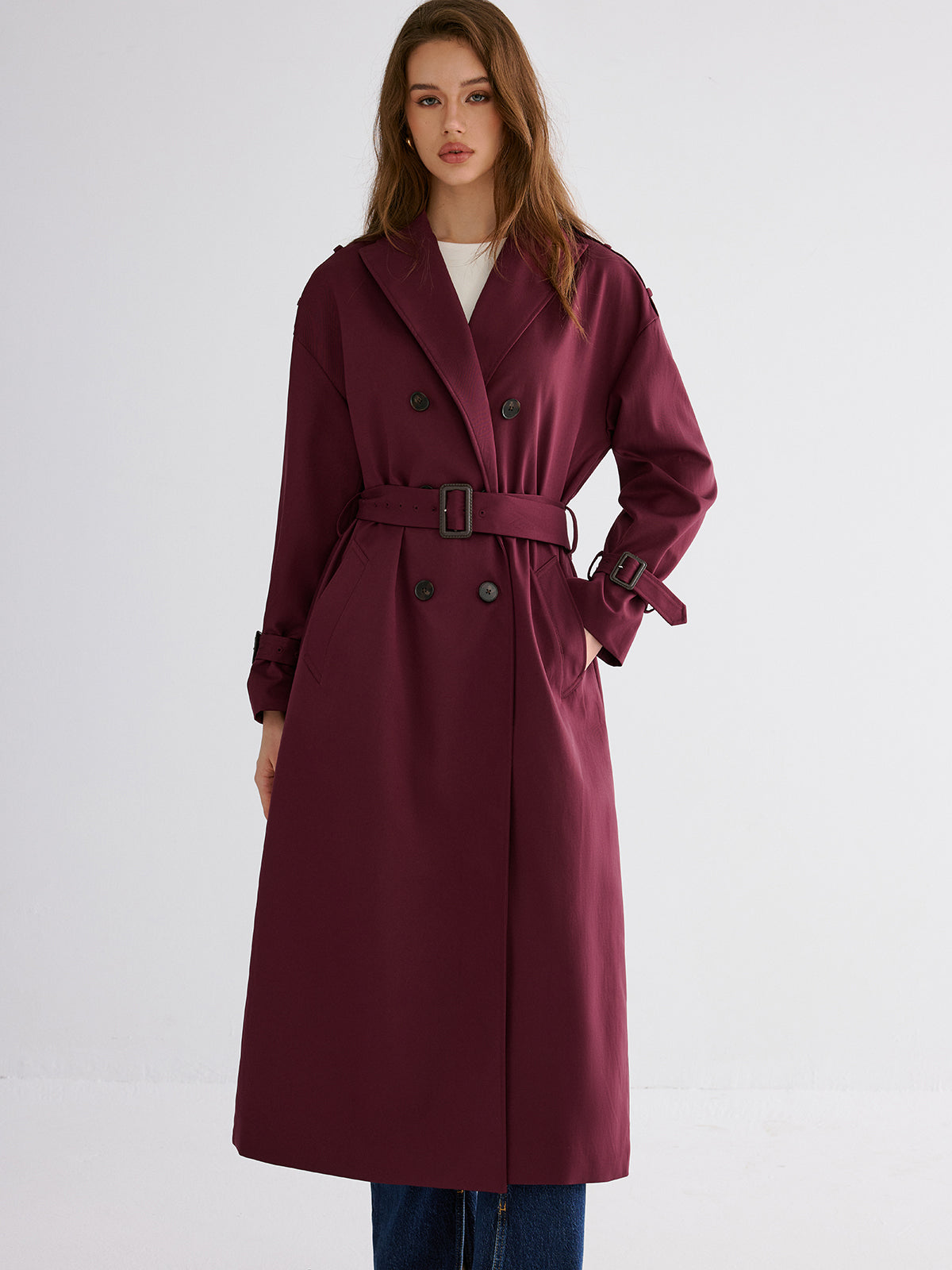 Trenchcoat mit Gürtel und plissiertem Saum