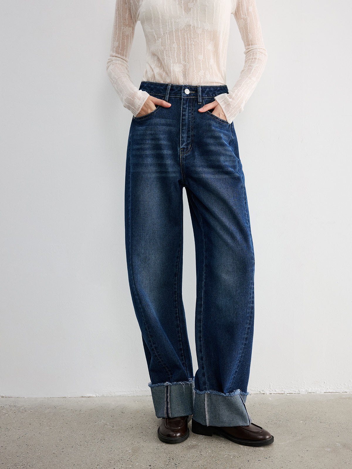 Jean large en denim à revers effilochés