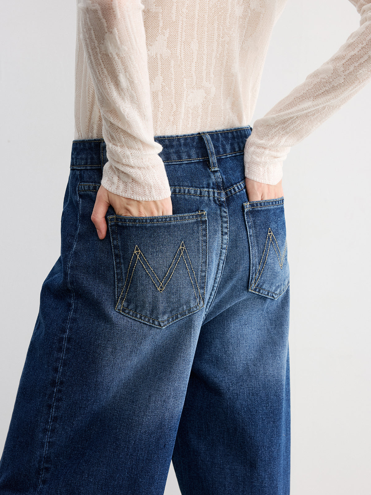 Jean large en denim à revers effilochés