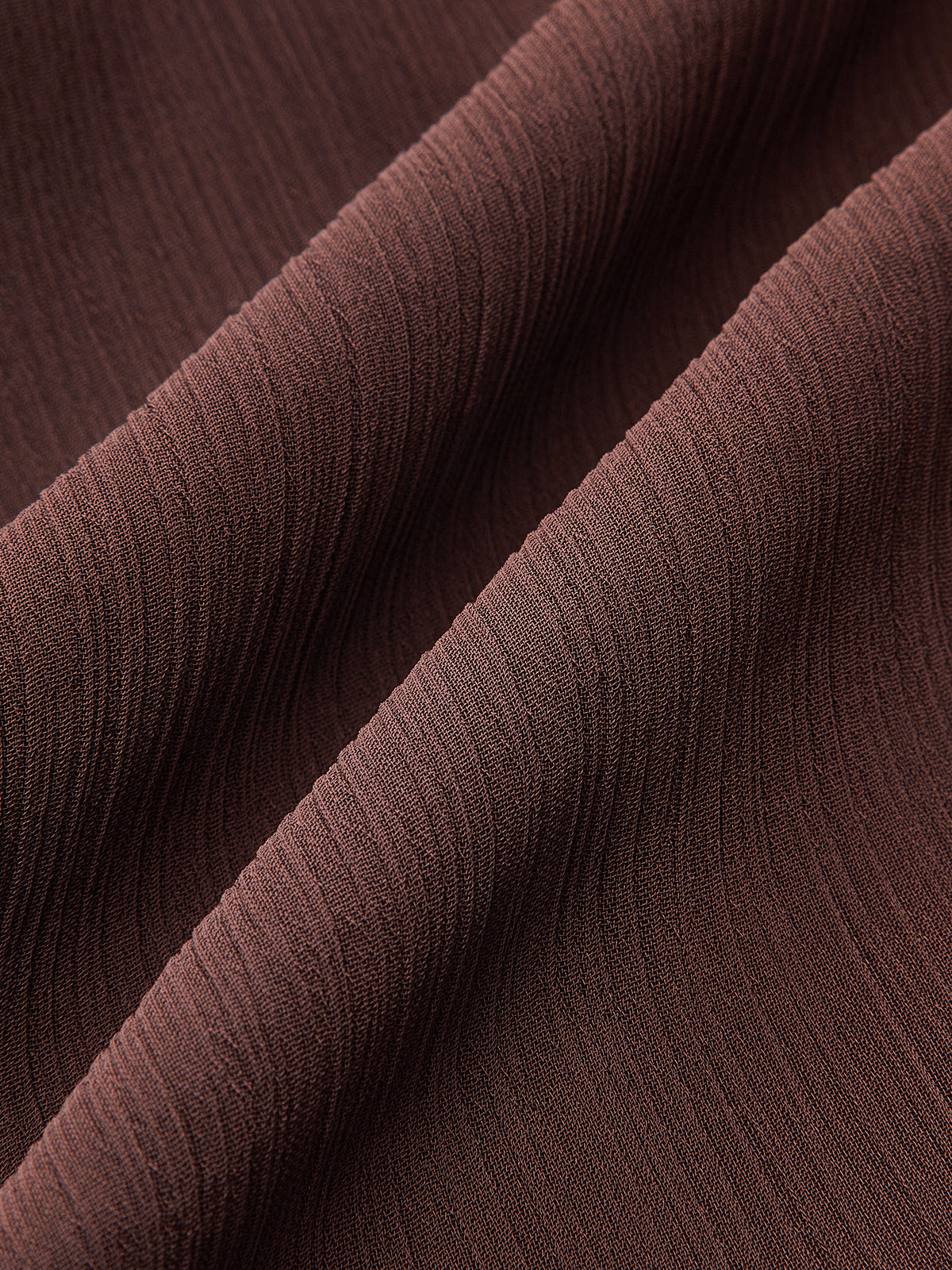 Robe longue à manches longues avec nœud en mousseline