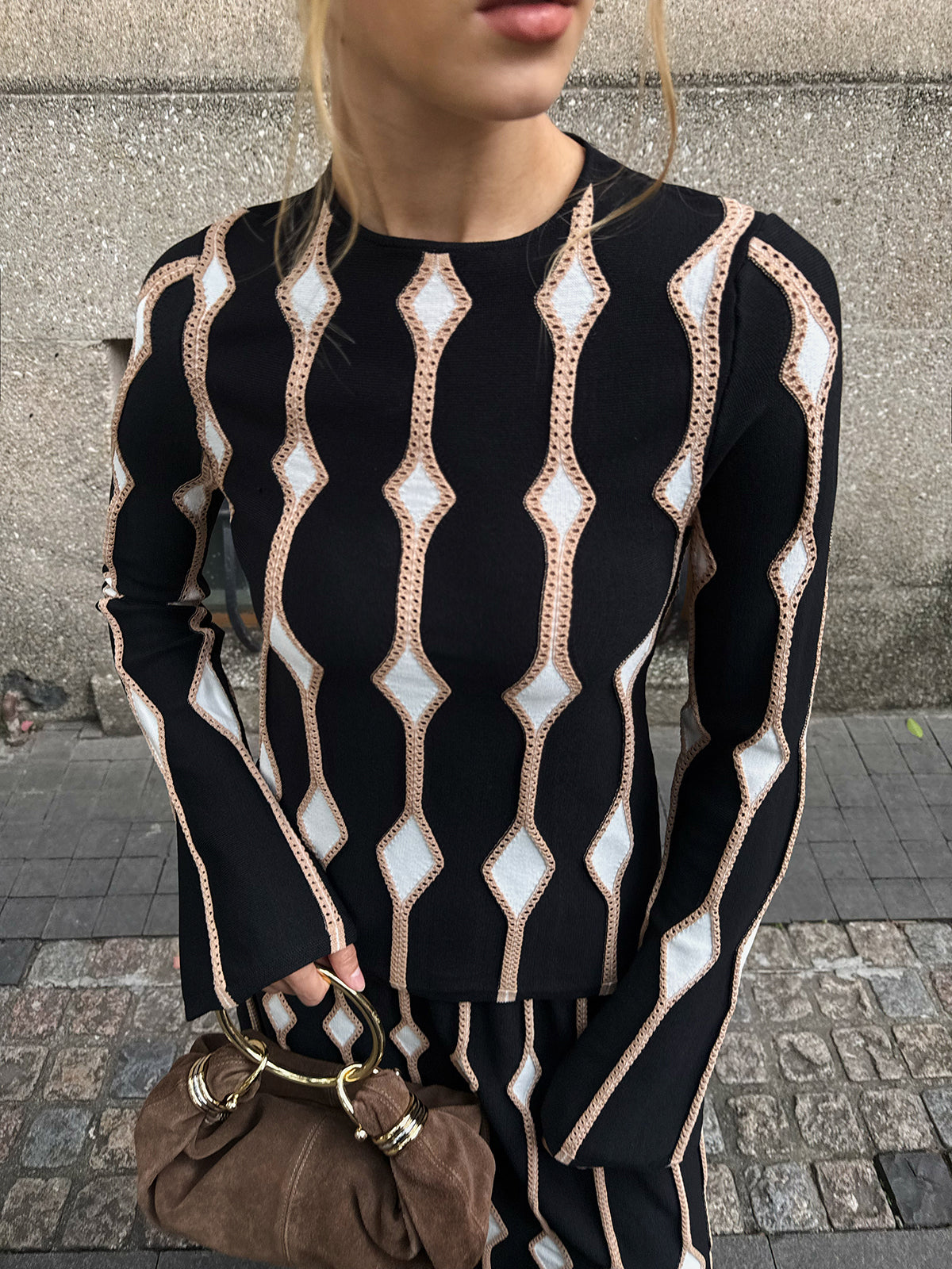 Haut en maille à motif géométrique