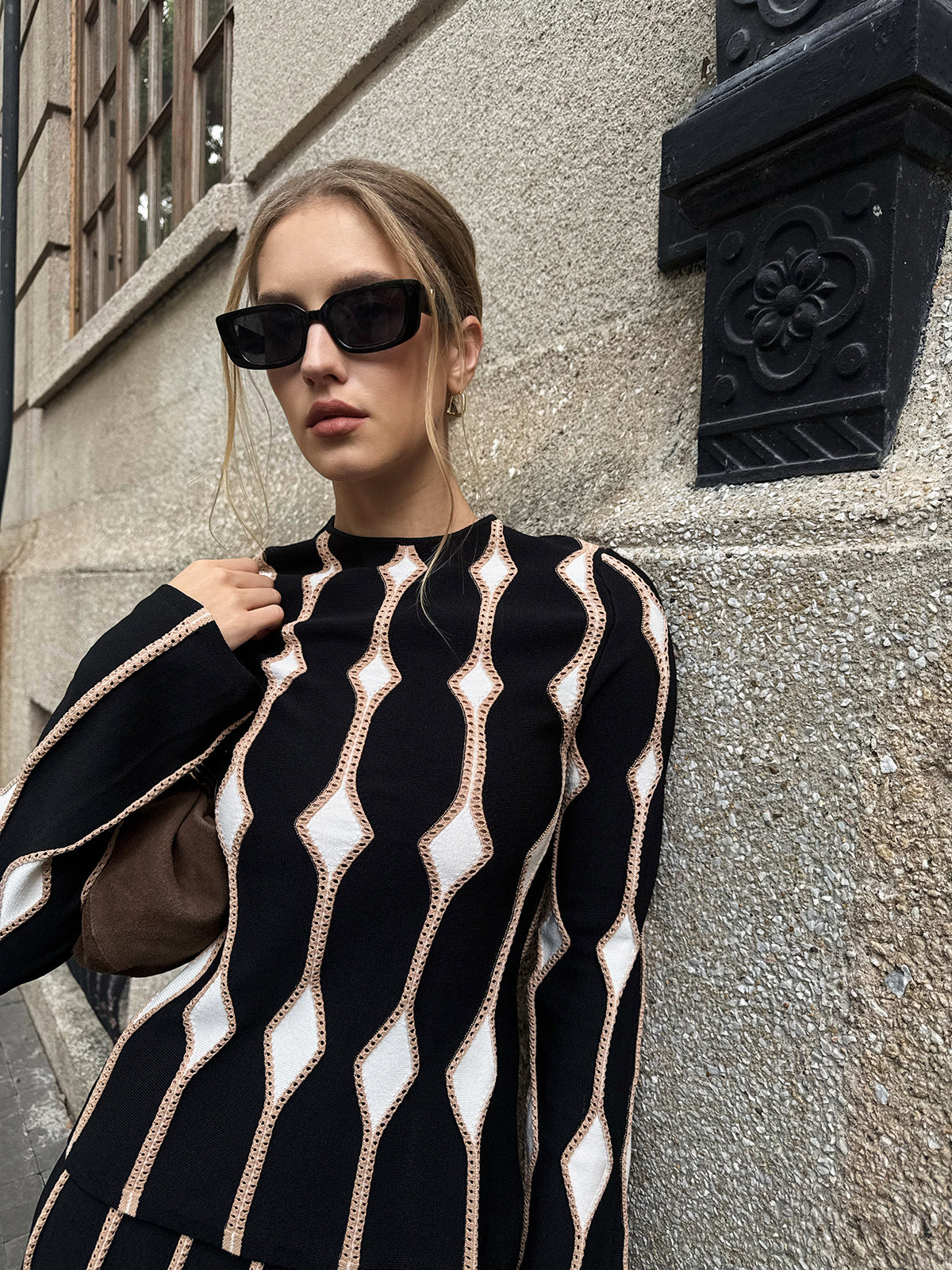 Haut en maille à motif géométrique