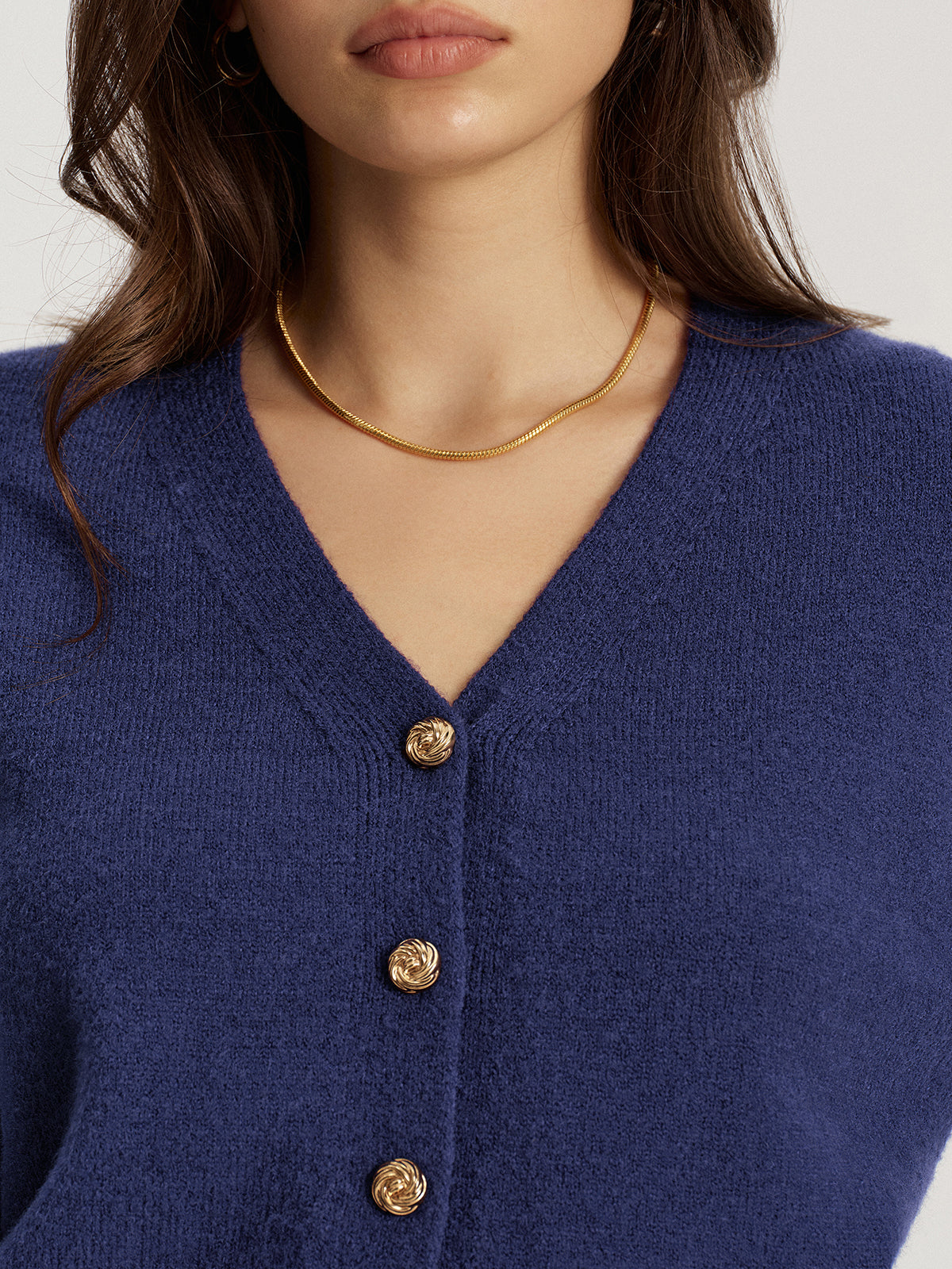 Cardigan en maille à col en V et boutons en métal