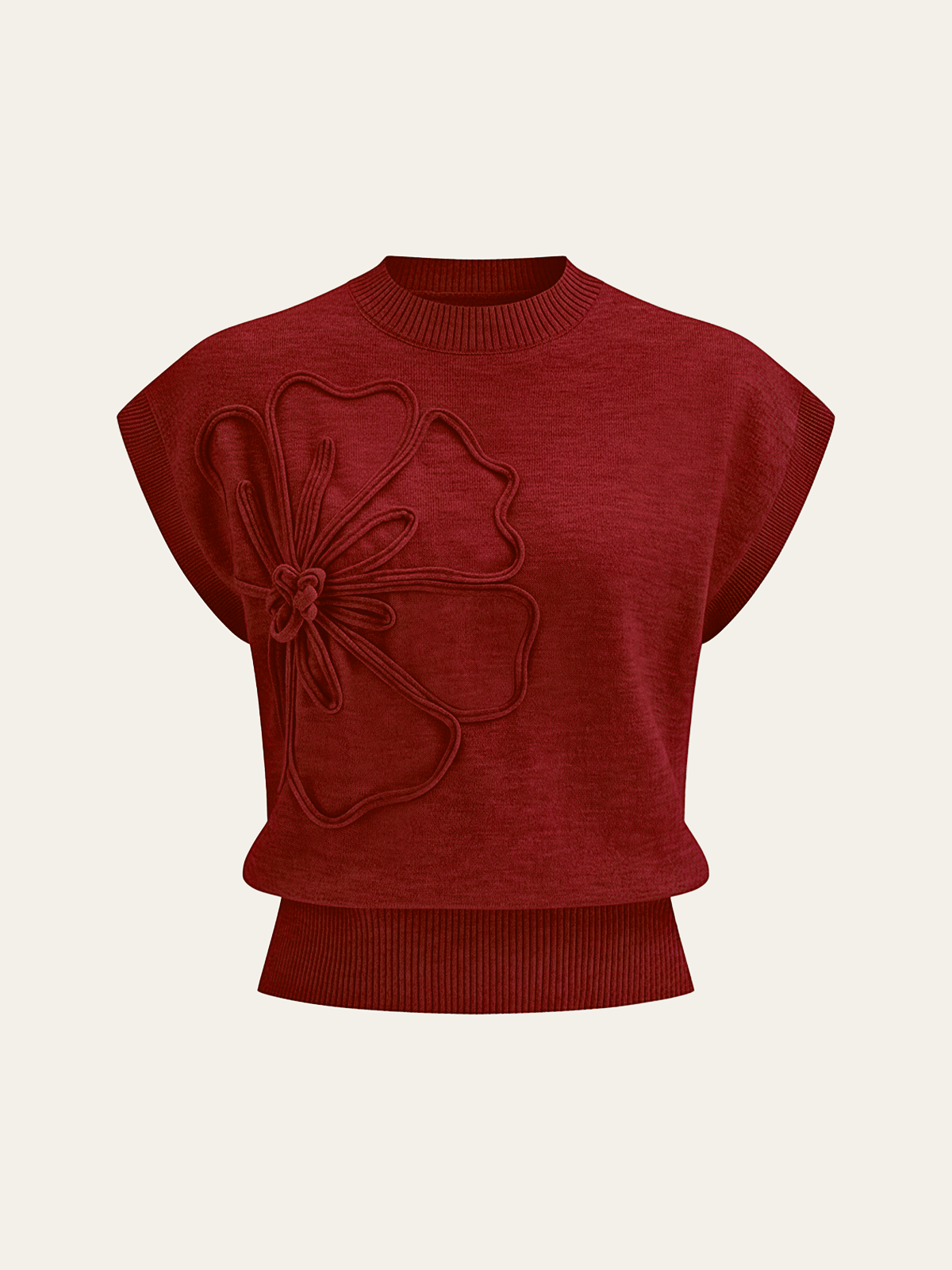 Stricktop mit Blütenapplikation und Kappenärmeln
