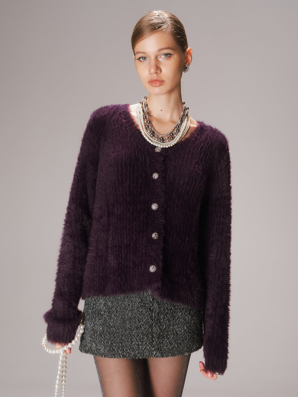 Gilet en maille duveteuse boutonnée