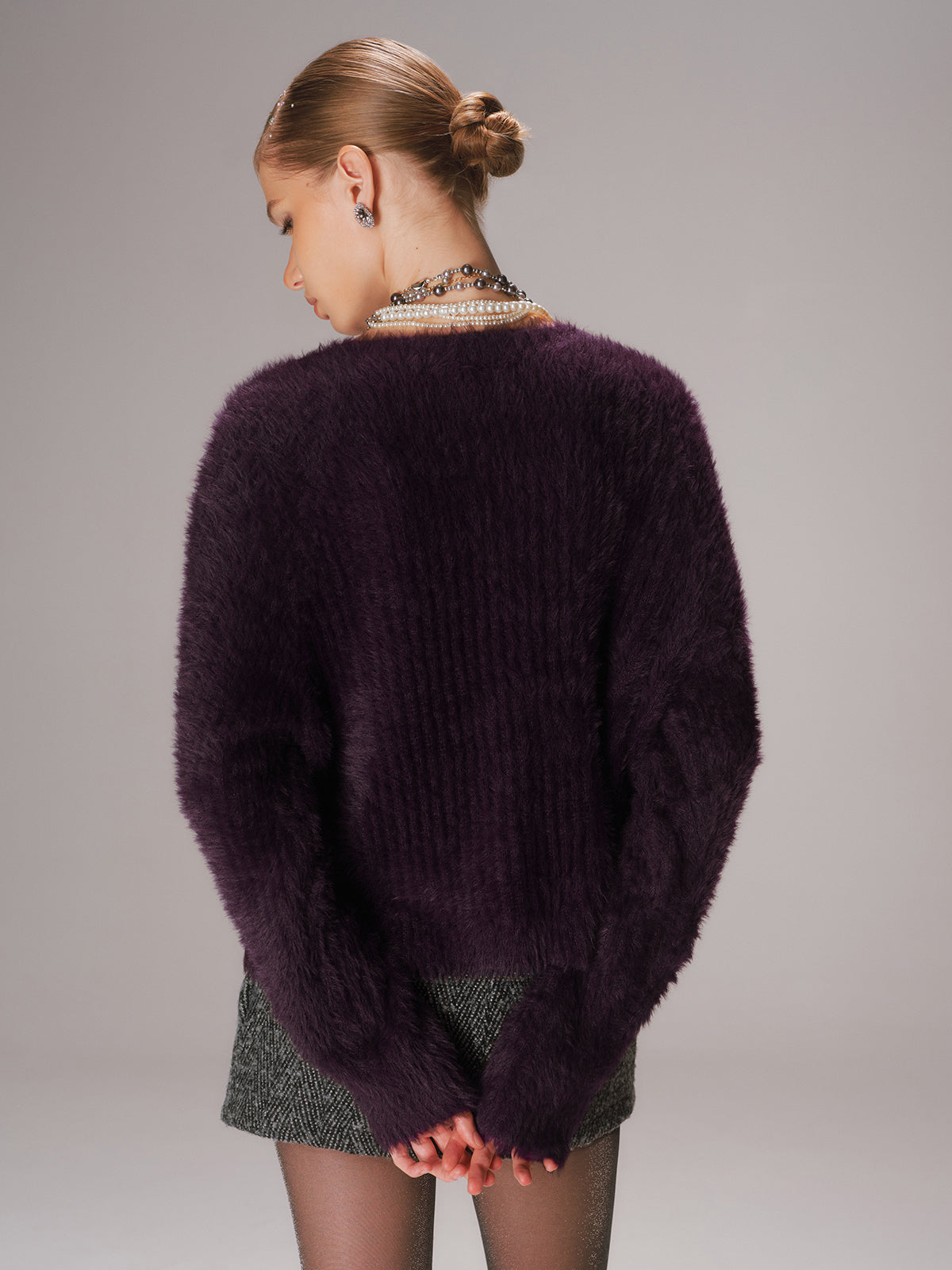 Gilet en maille duveteuse boutonnée