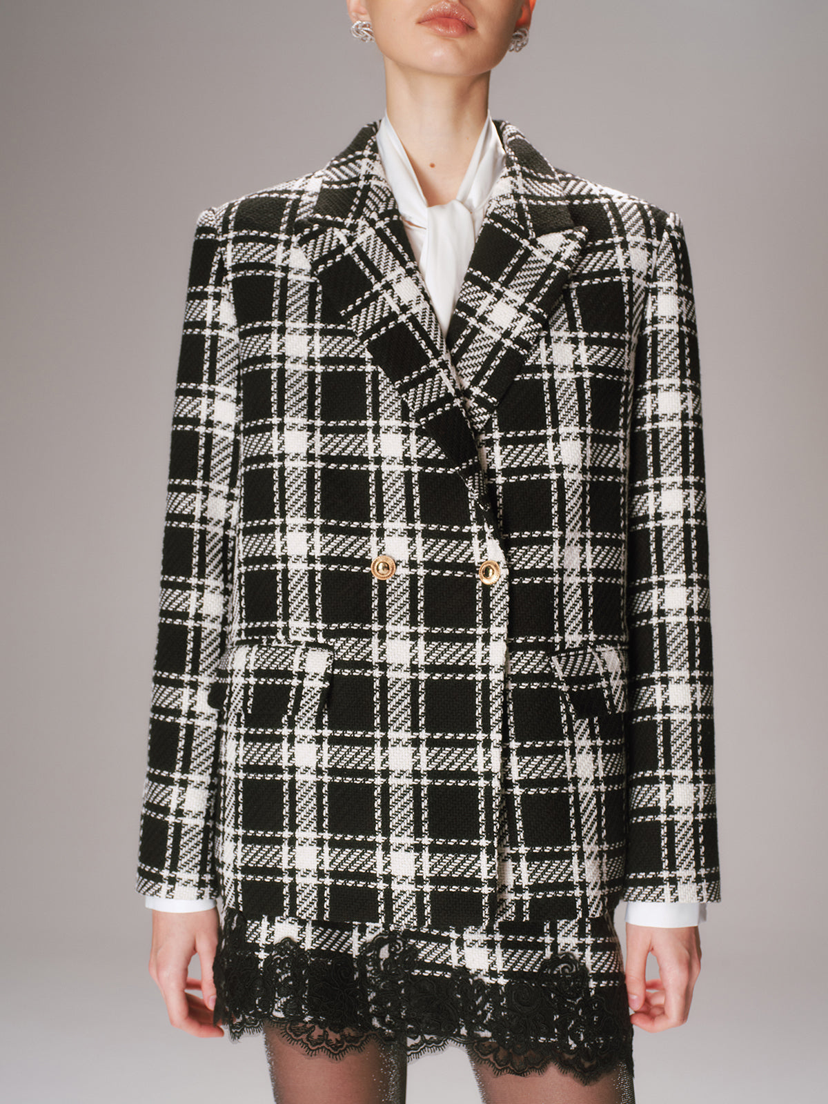 Blazer en tweed à carreaux et boutons métalliques