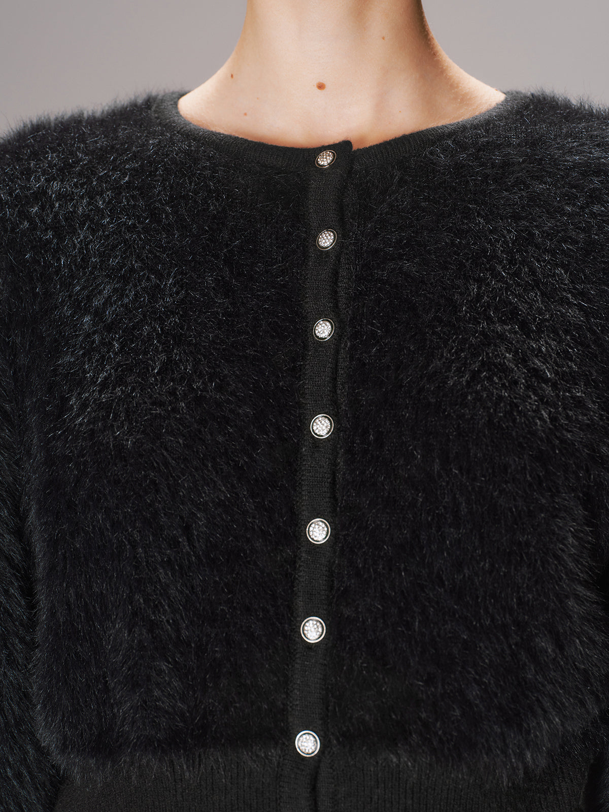 Gilet court boutonné en fausse fourrure de vison