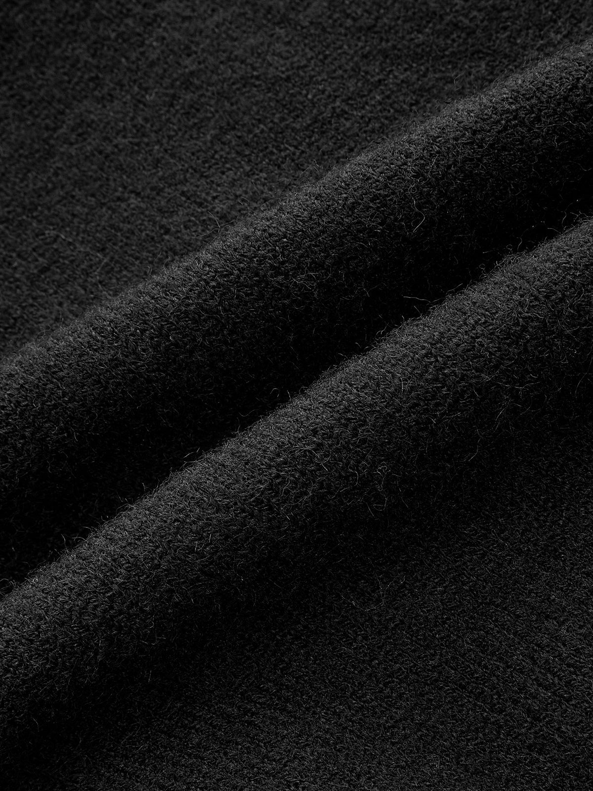Polo en tricot avec broderie contrastante